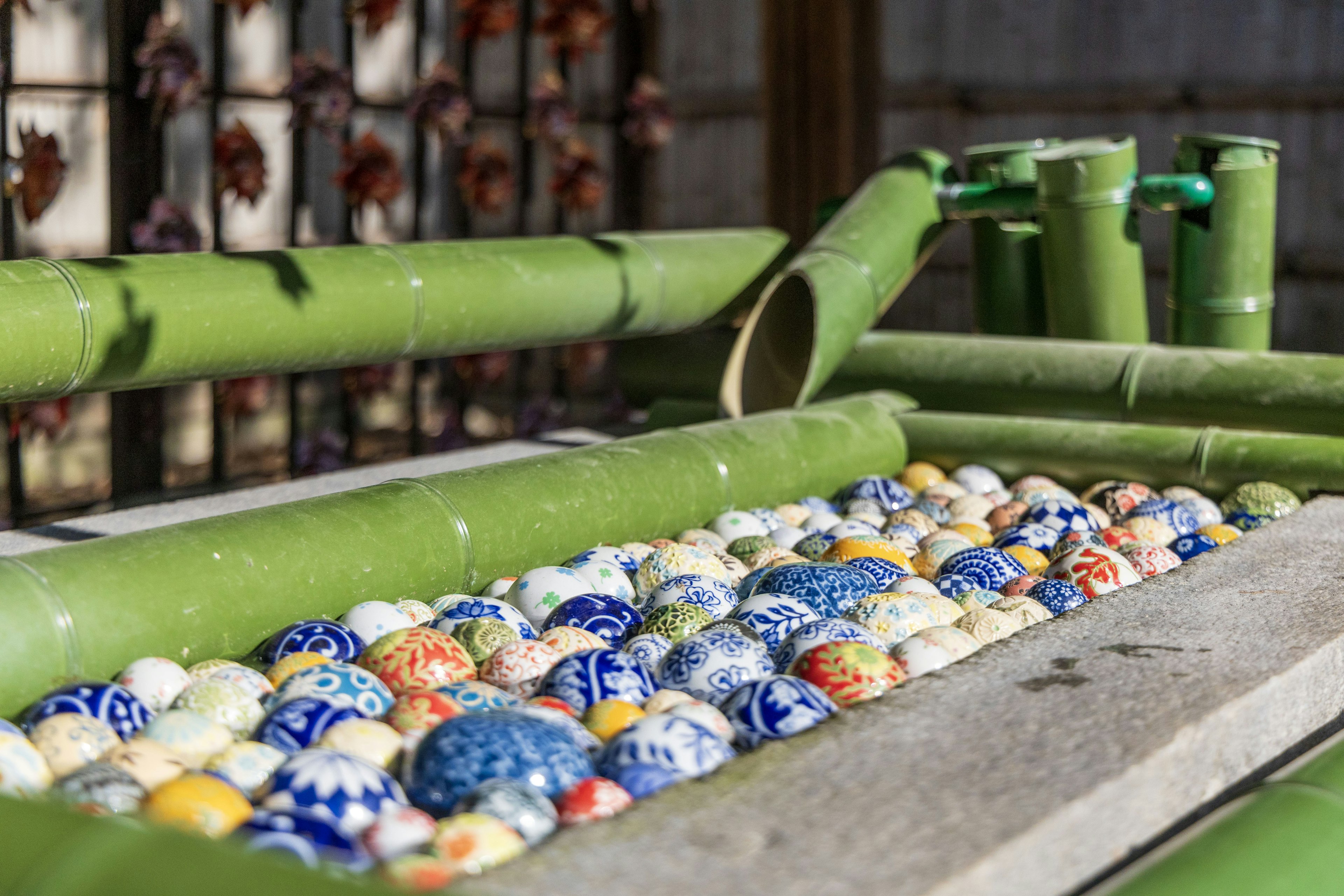 Bamboo structure with colorful ceramic balls arranged