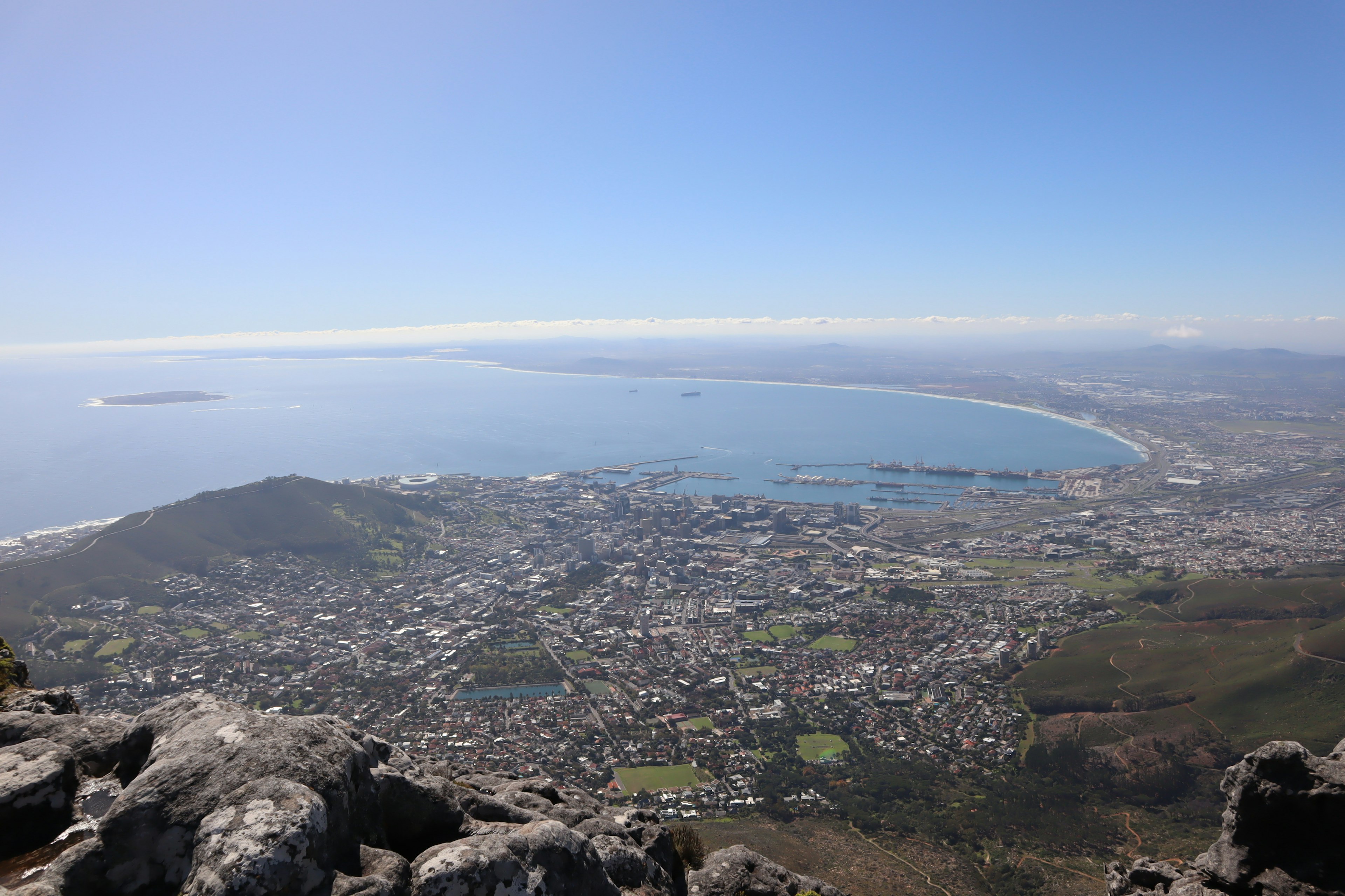 Panoramic view of coastline and cityscape from Table Mountain