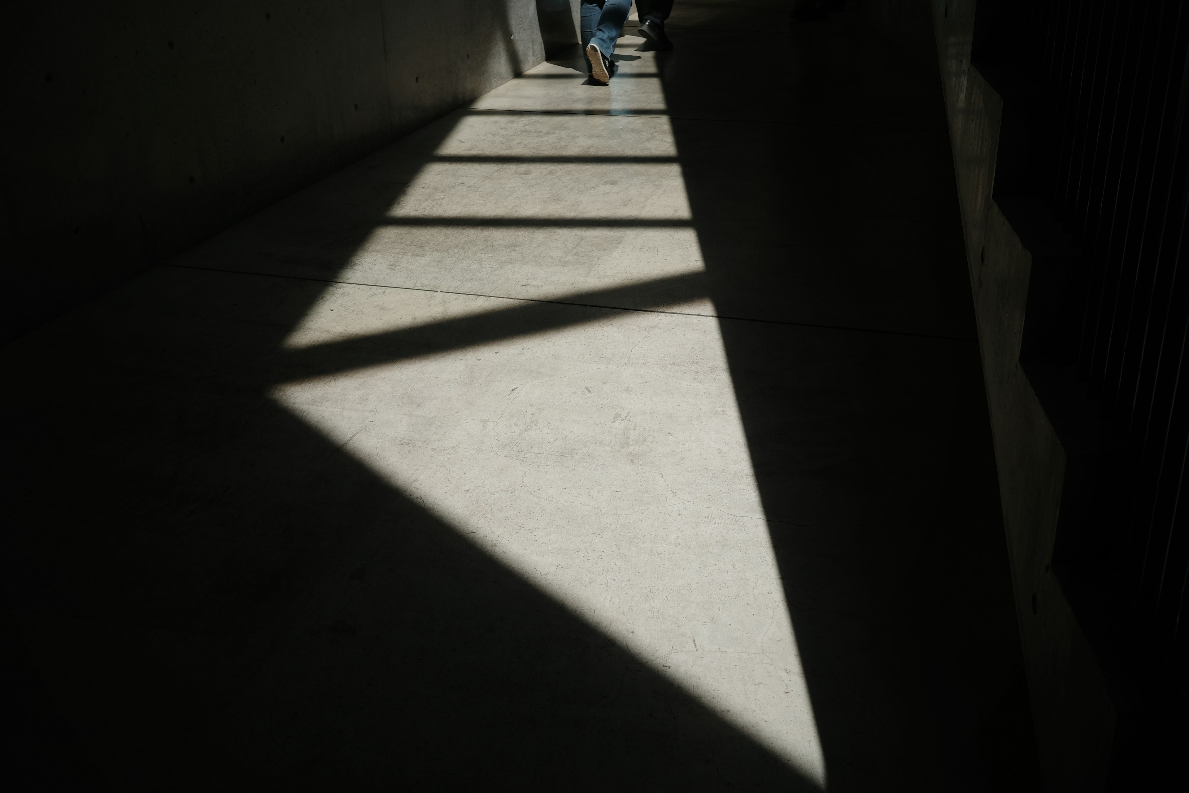 Geometric patterns of shadows in a bright corridor