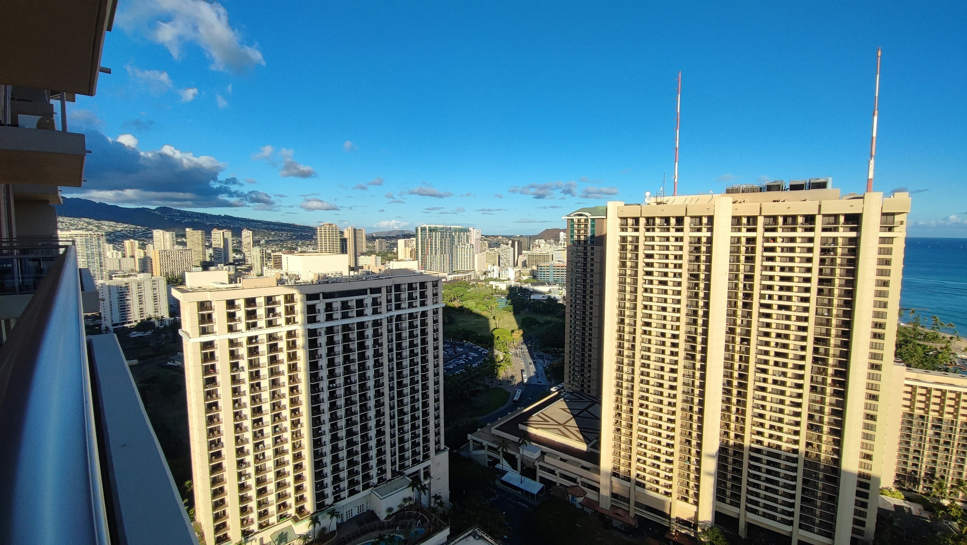 View of Honolulu skyscrapers under a clear blue sky