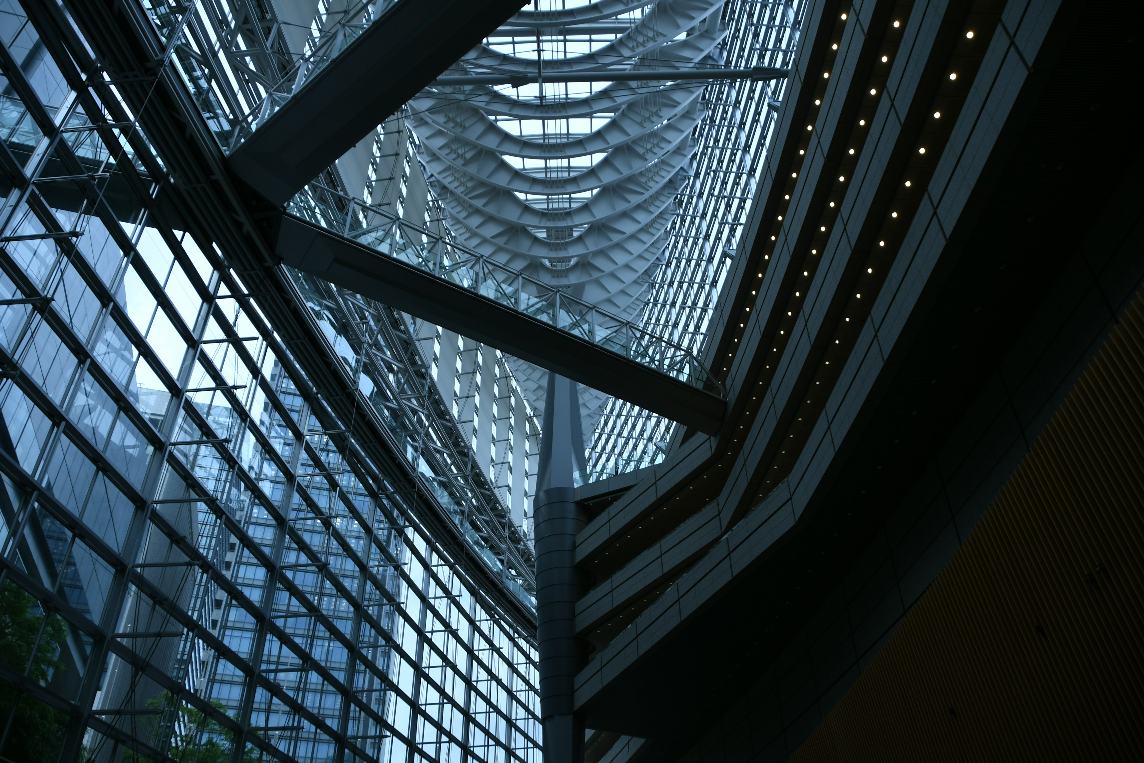 Image showing the interior structure of a modern building featuring structural design and glass reflections