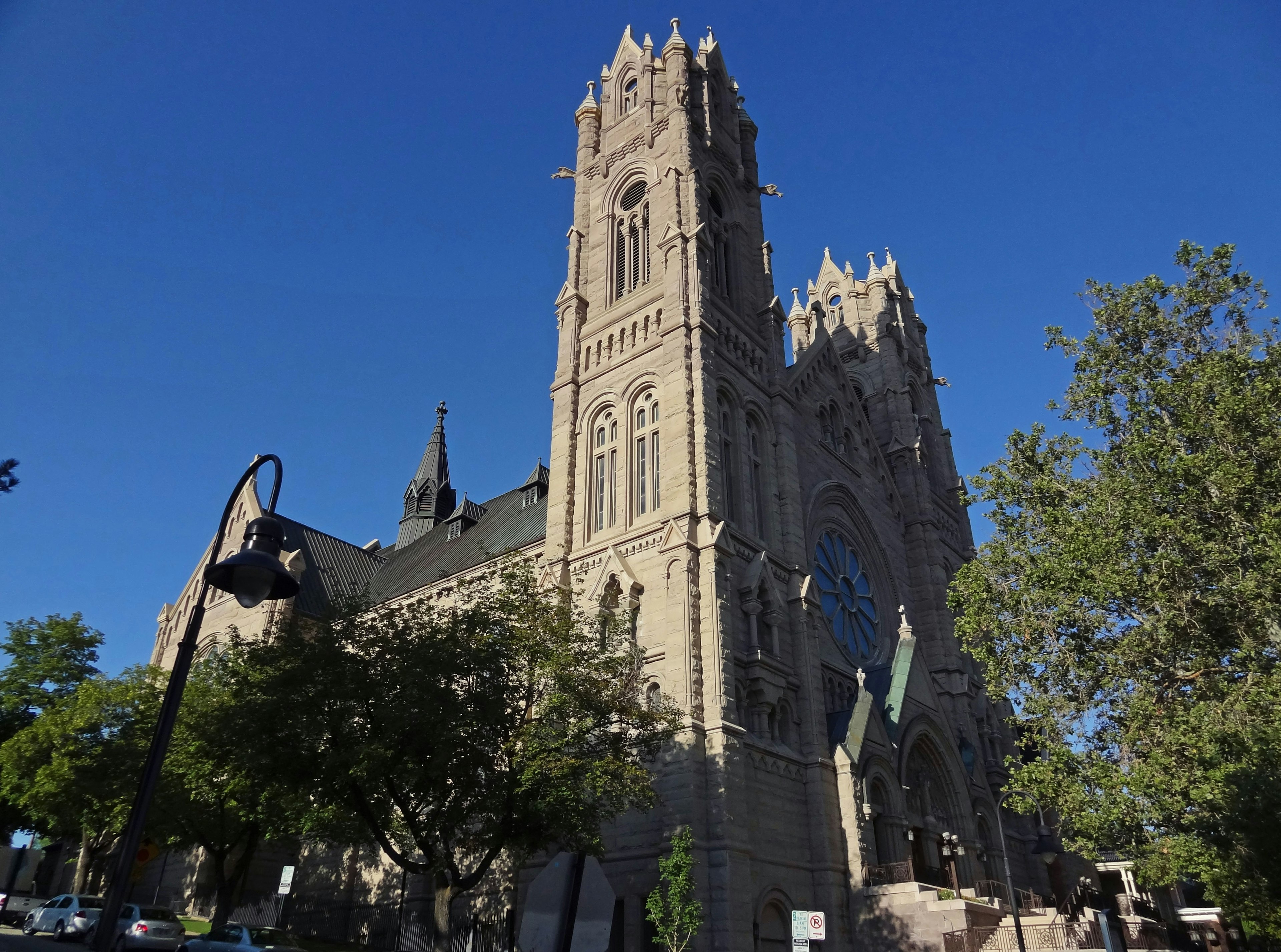 Stunning Gothic-style church exterior standing under a blue sky