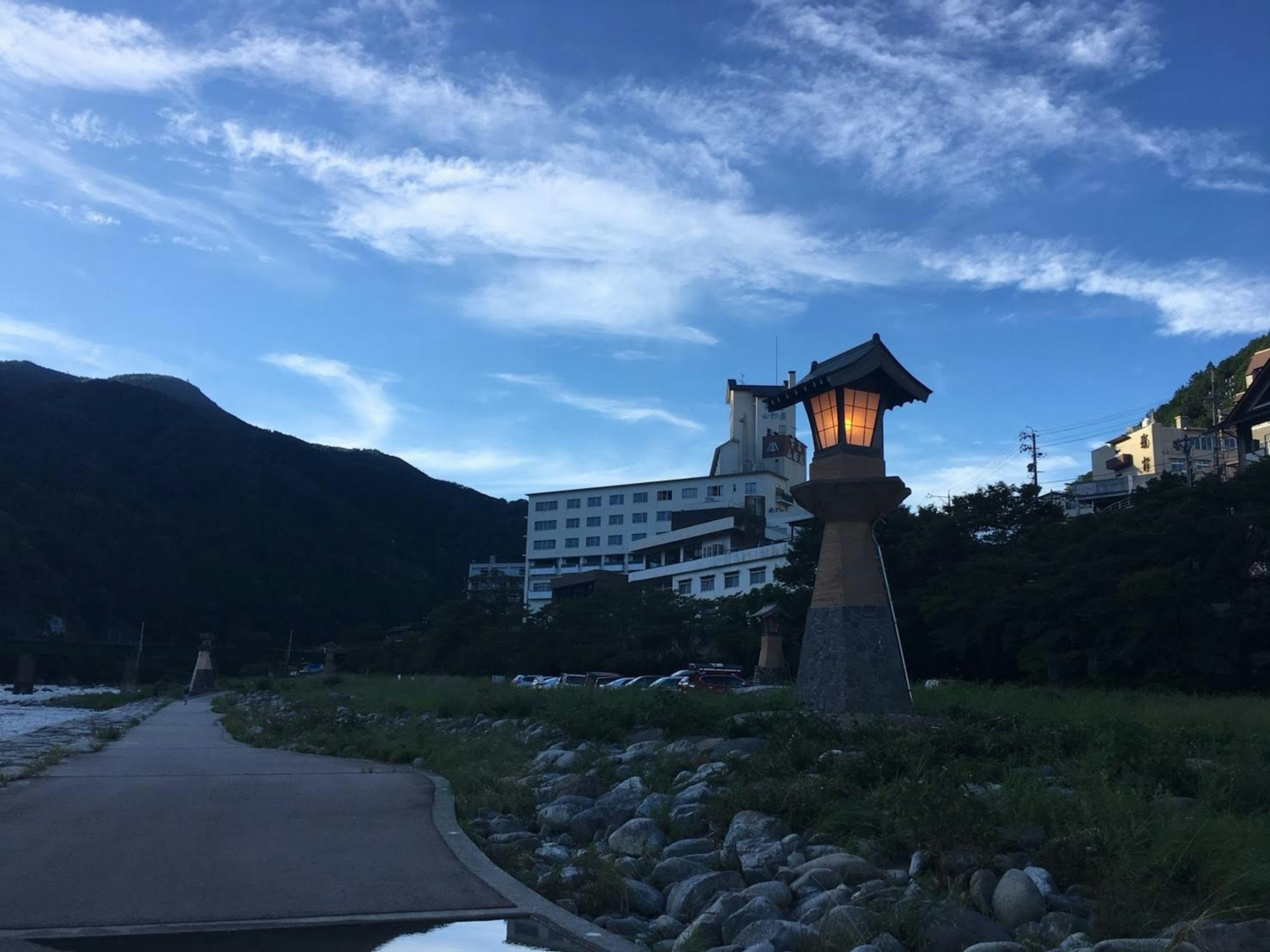 Coastal lantern with mountains in the background