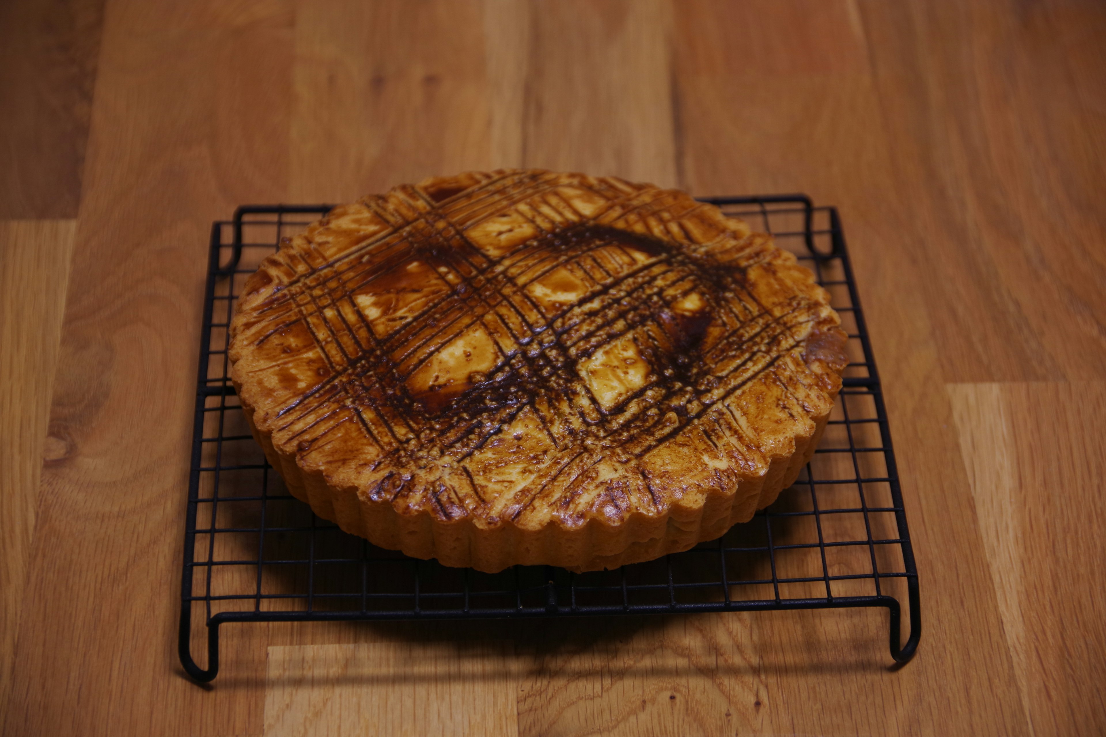 Freshly baked pie on a cooling rack