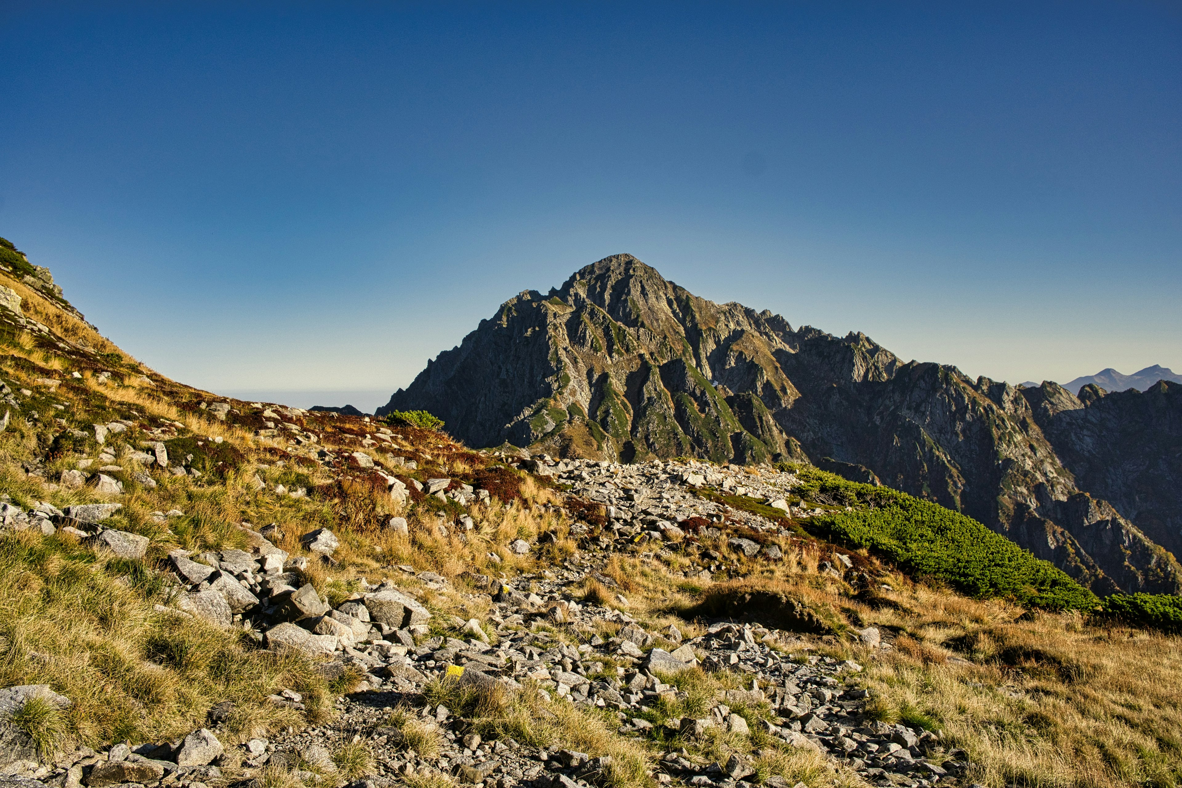 Scenic mountain landscape with clear blue sky