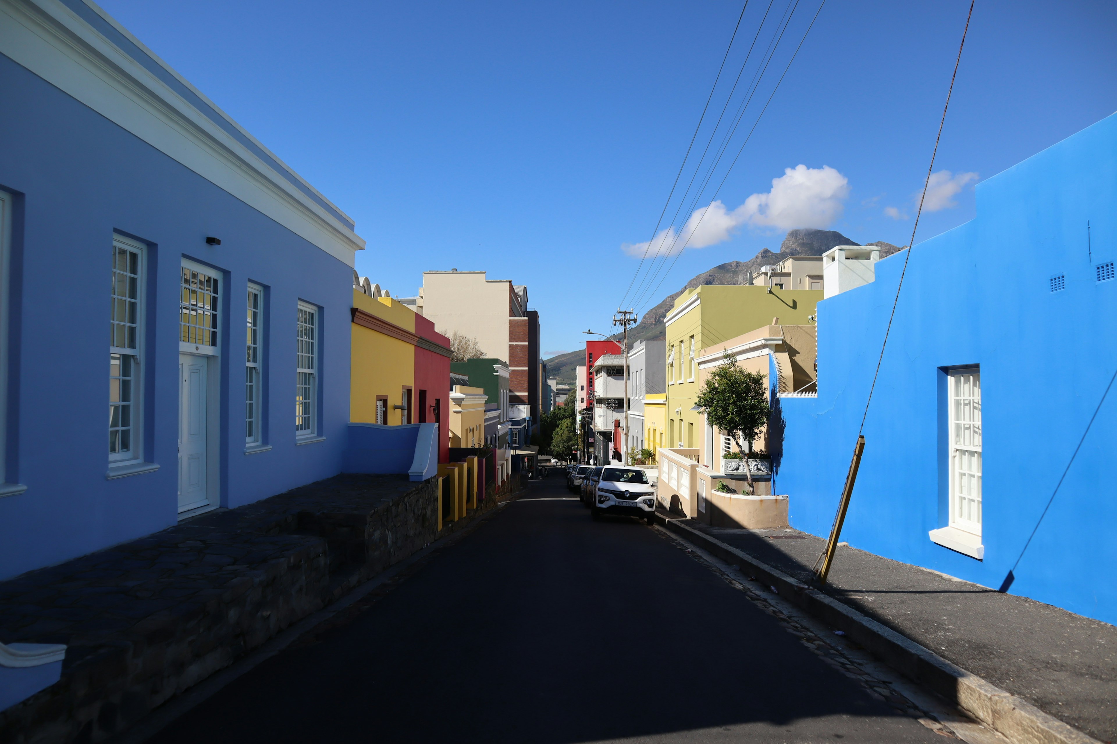 Colorful houses lining a narrow street