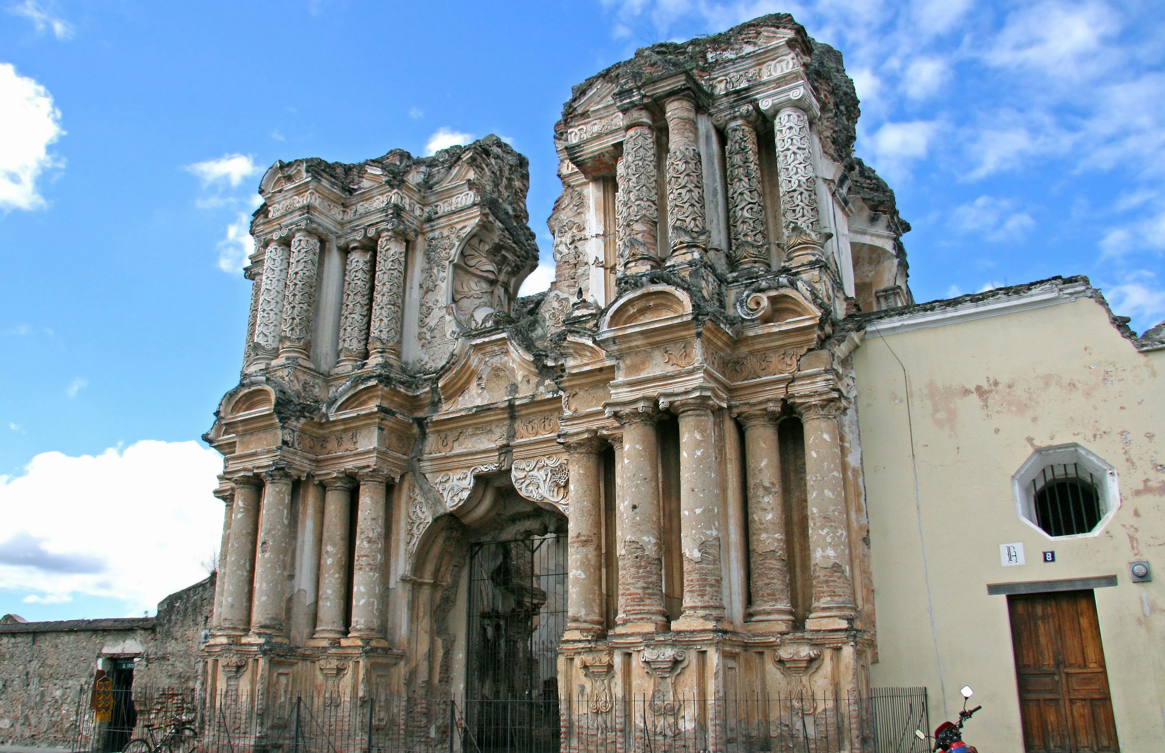 Grand ruins of an old building under a blue sky