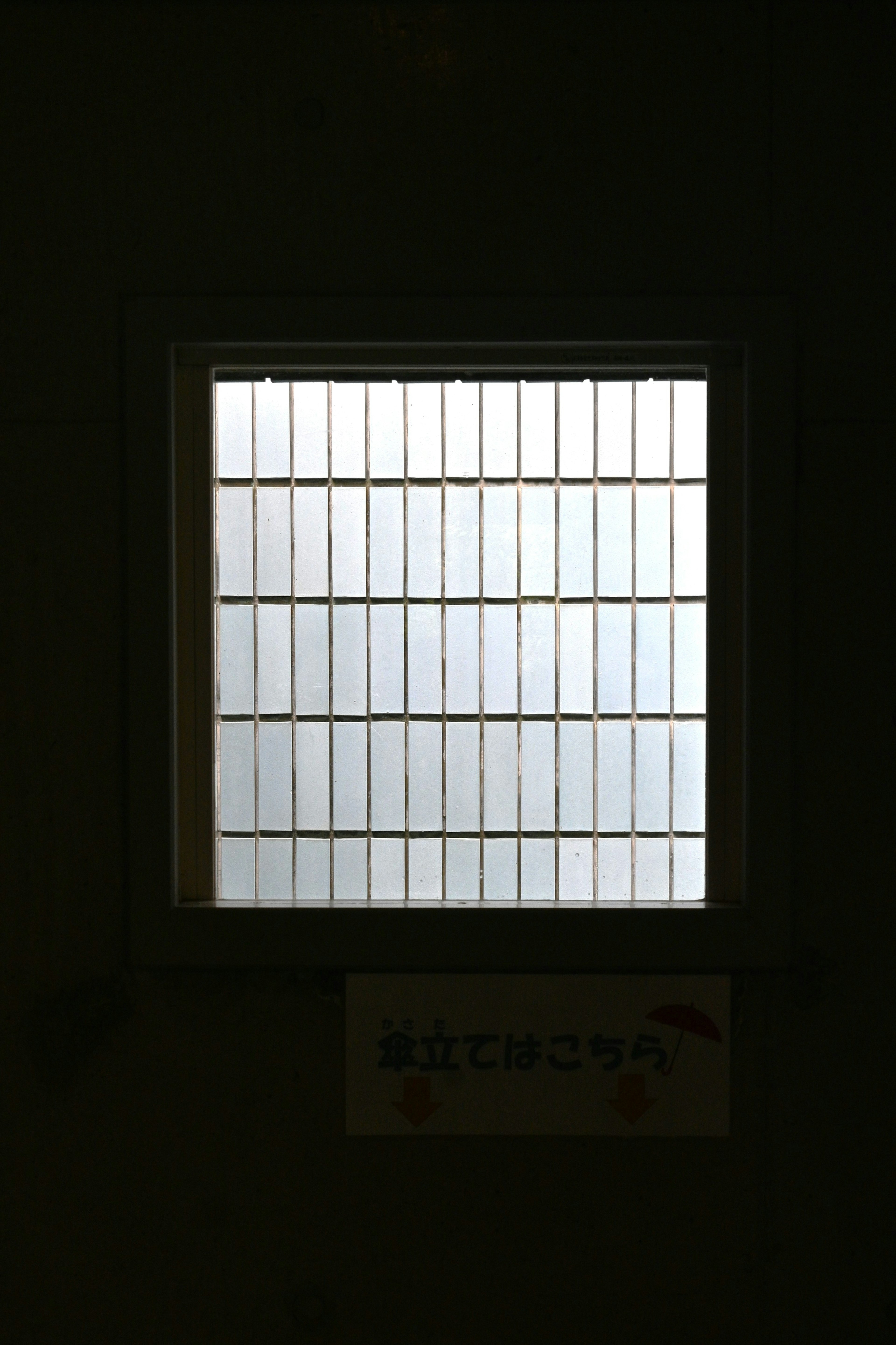 Simple interior image with light coming through a square window