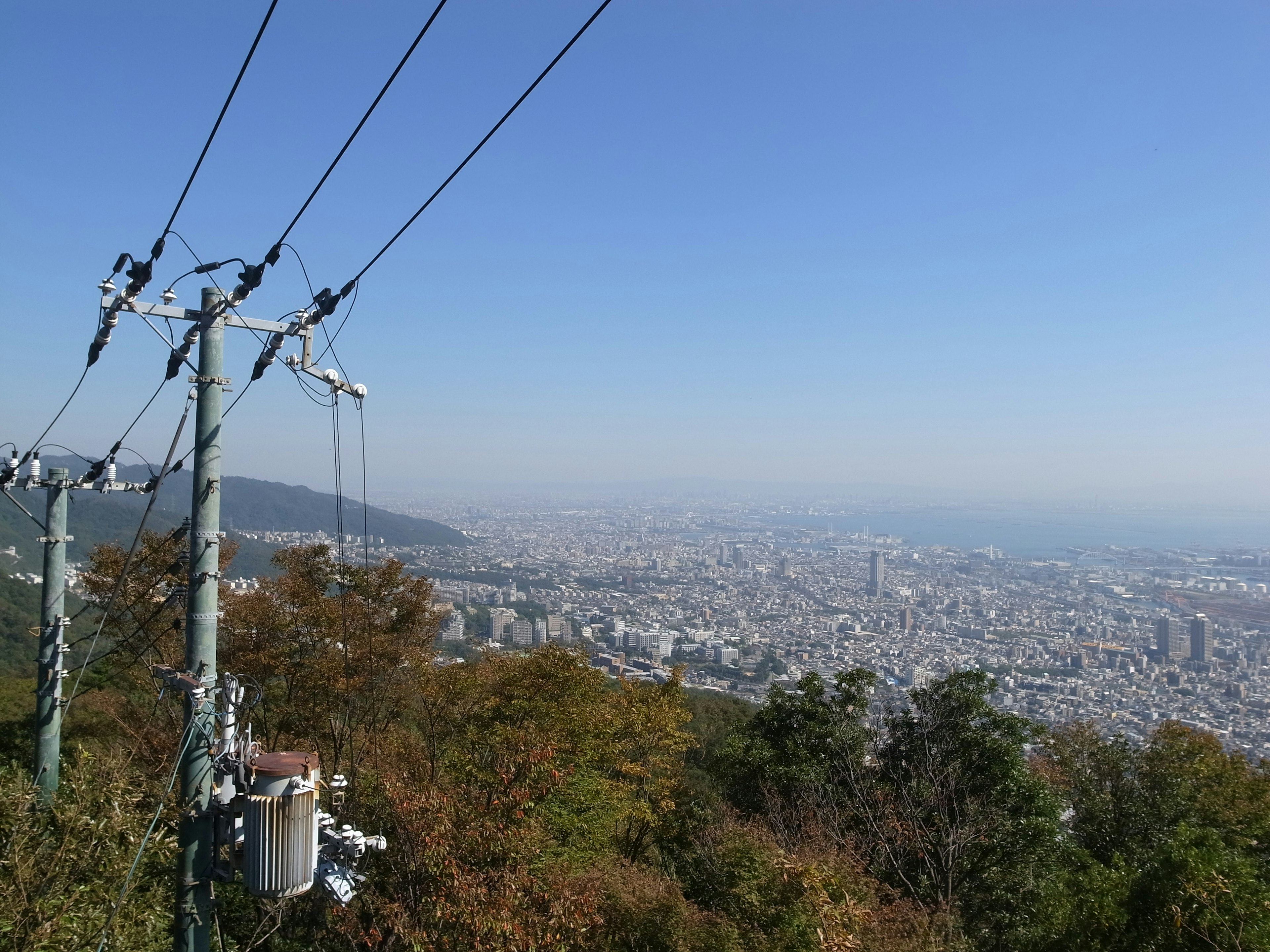 City view from a high point with power lines