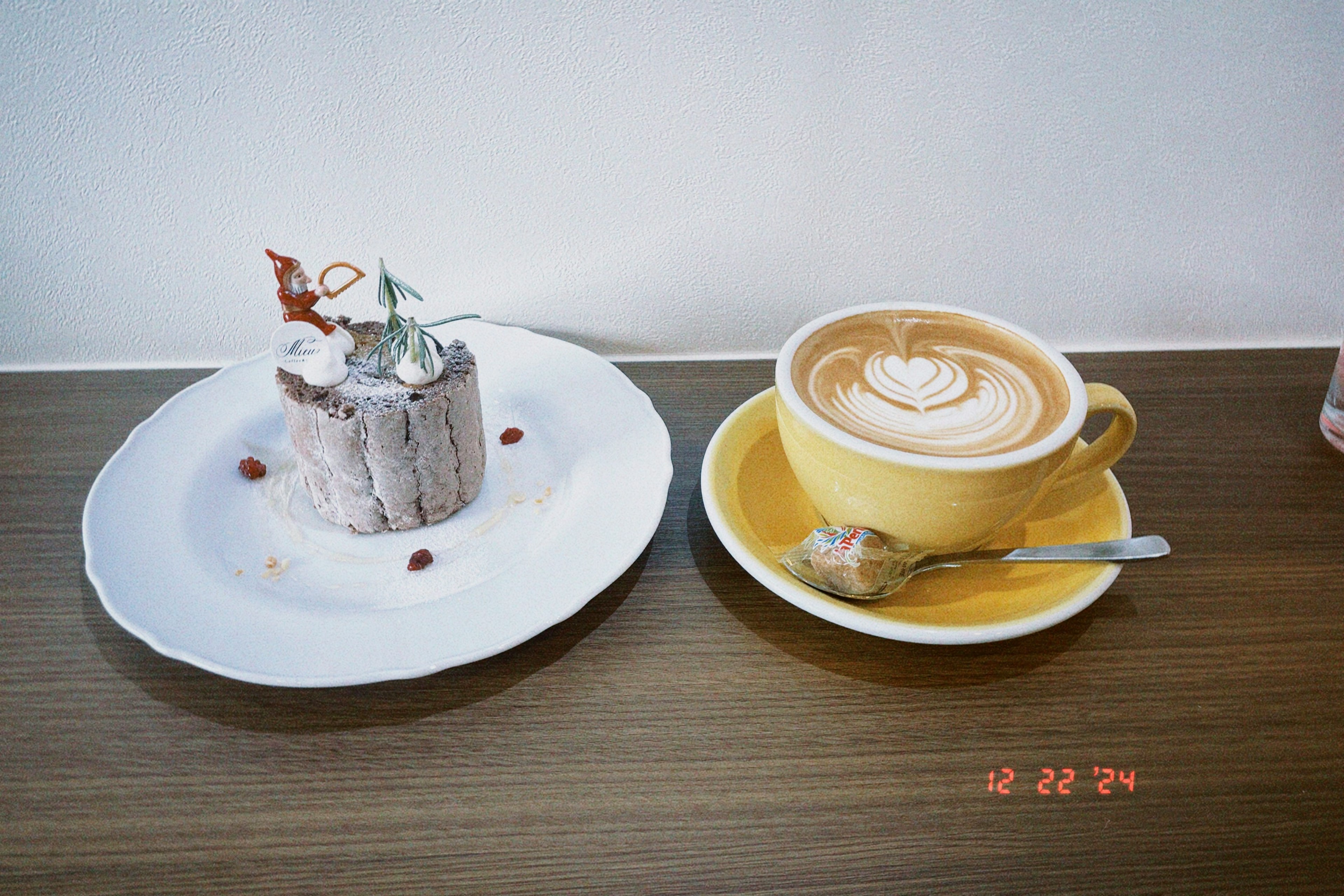 Coffee and cake set on a wooden table