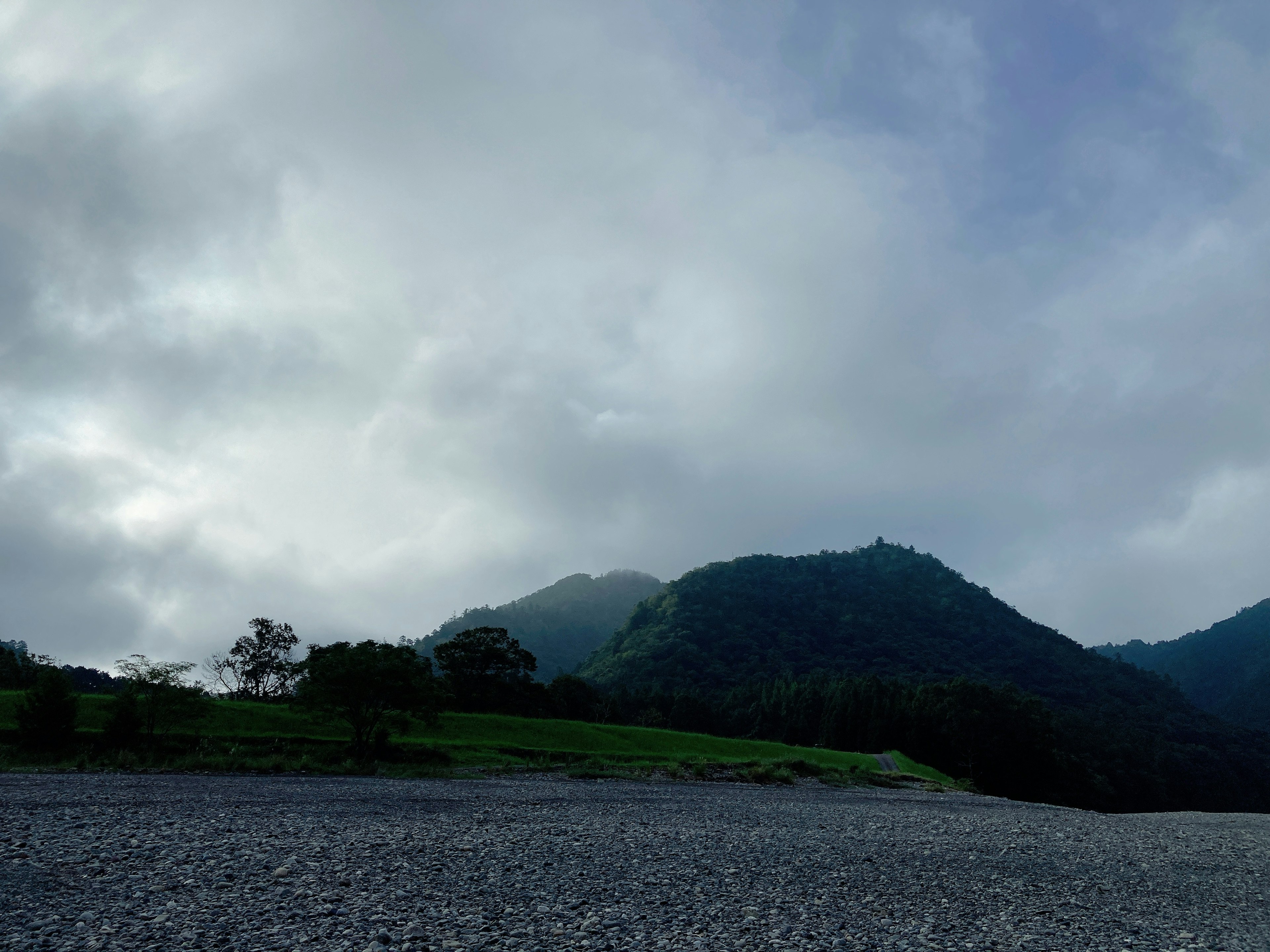 Landscape featuring mountains and cloudy sky