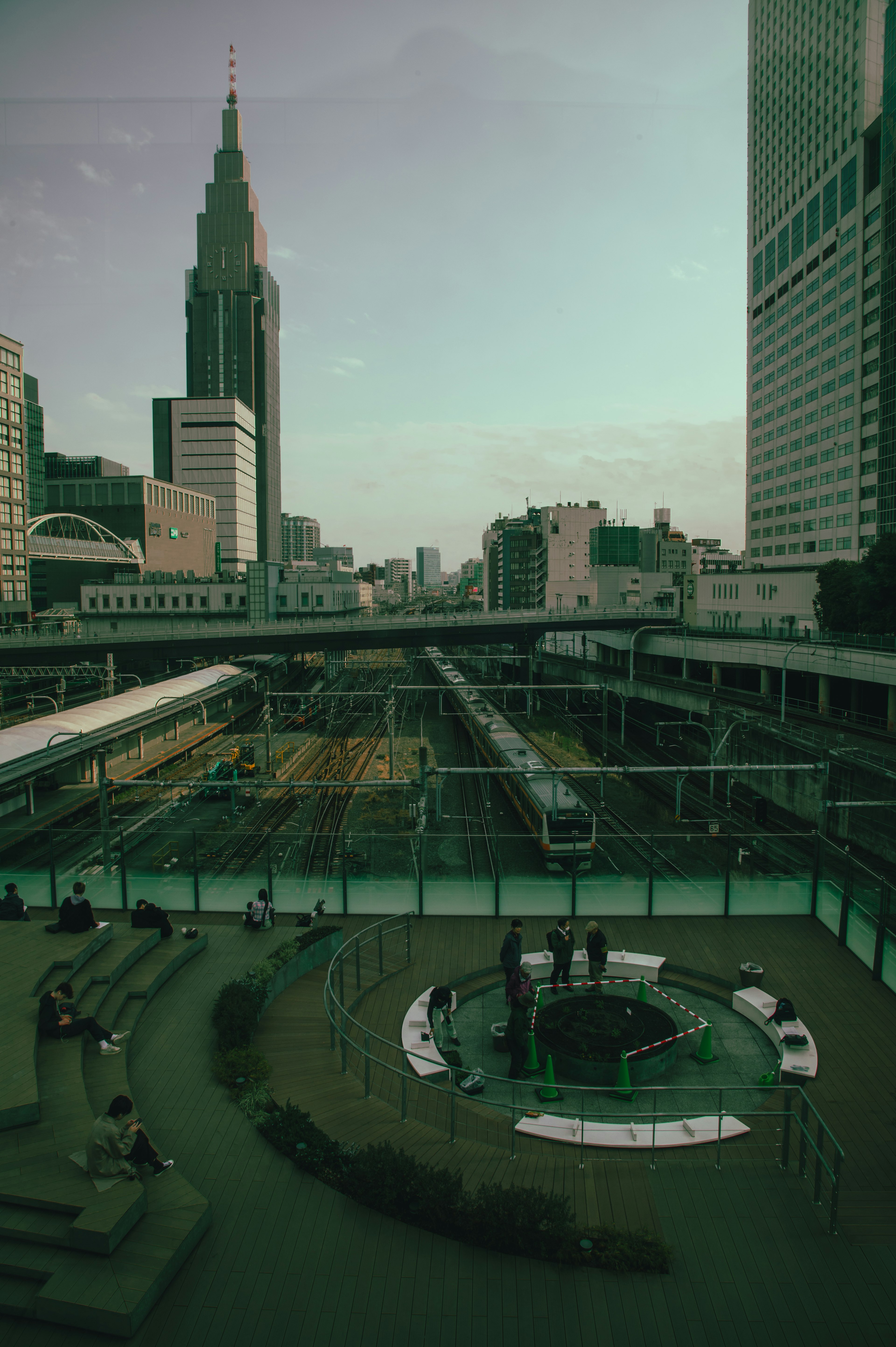 View of a cityscape with skyscrapers and a gathering area