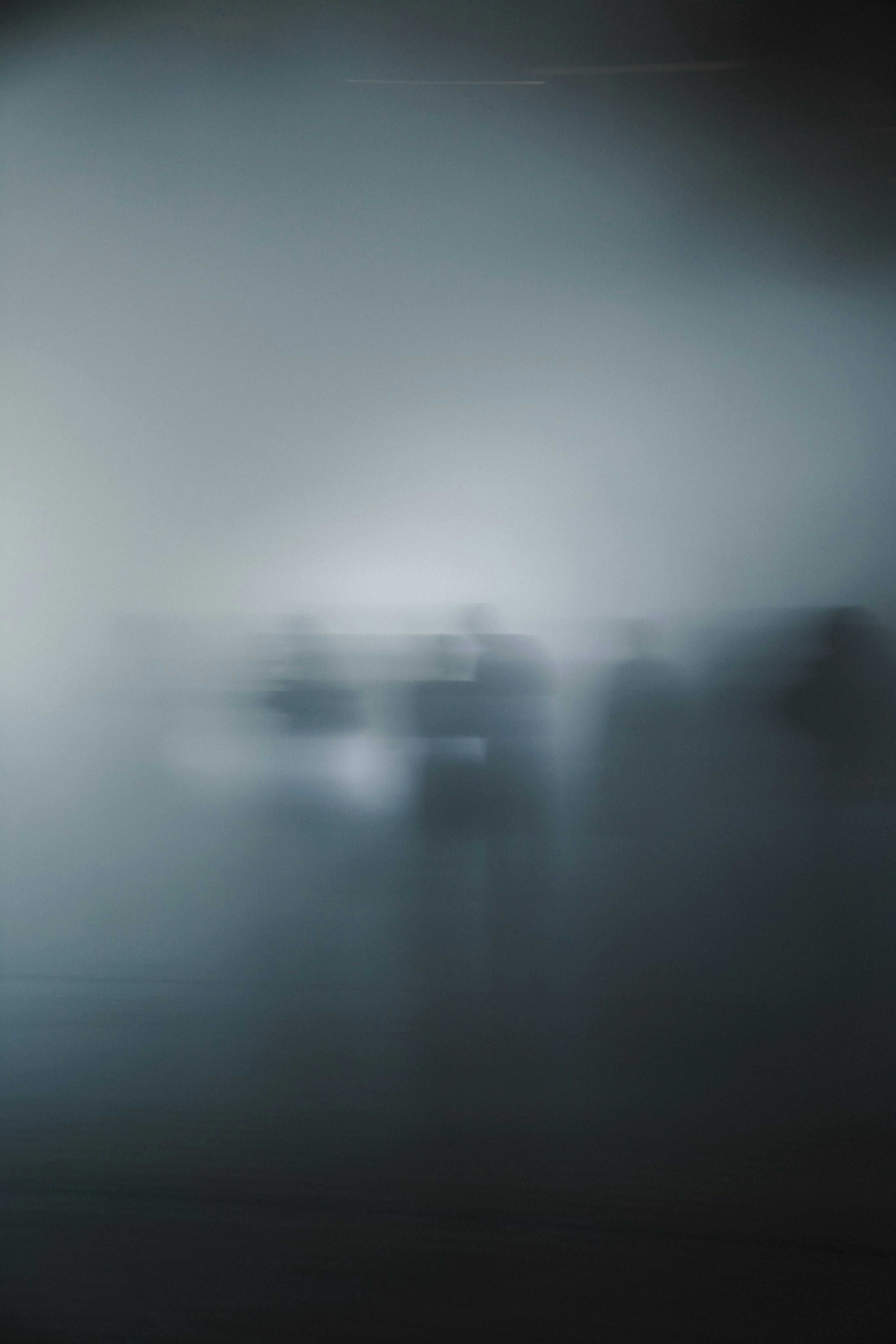 Image showing silhouettes of people against a blurred background