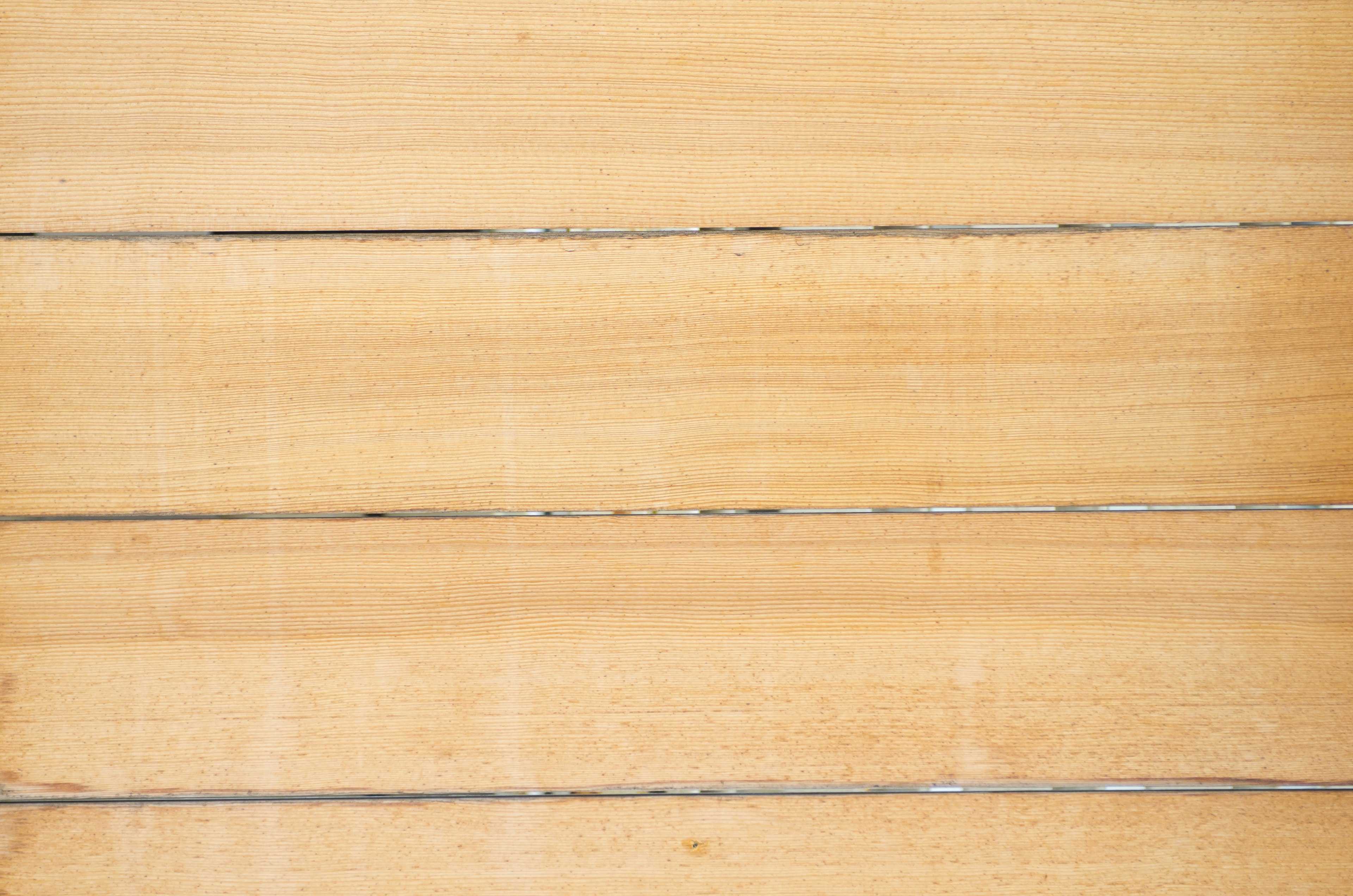 Flat surface featuring bright wood grain texture