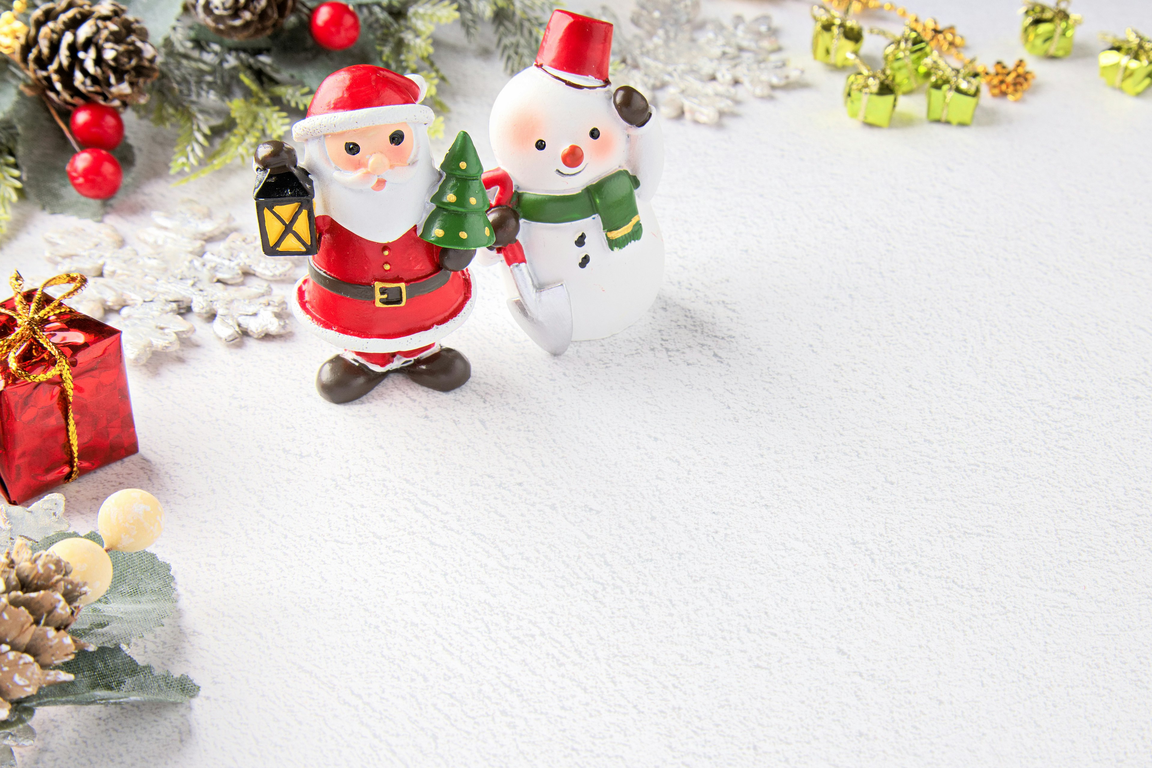 Christmas decoration featuring Santa Claus and a snowman