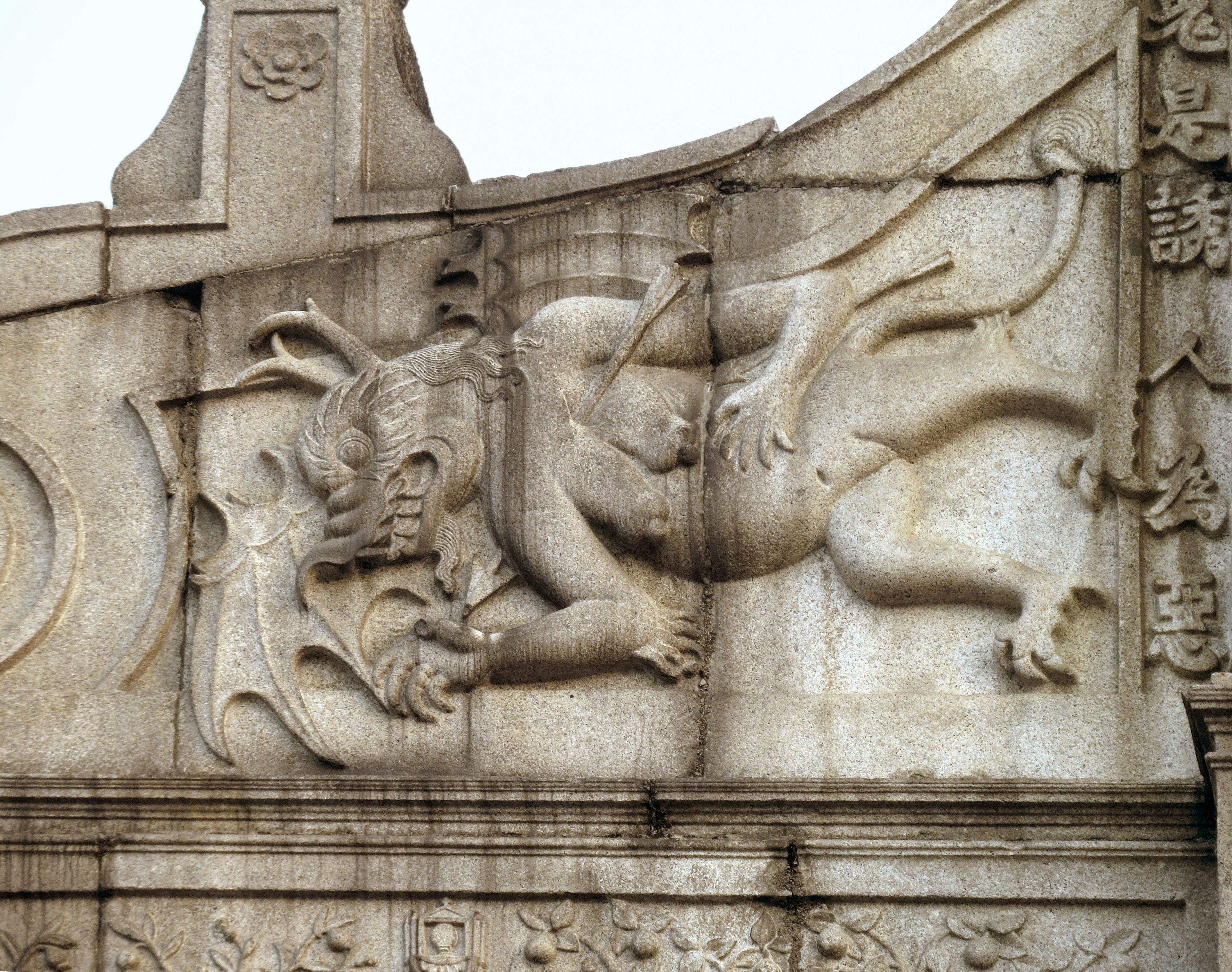 Detailed stone carving of a dragon design