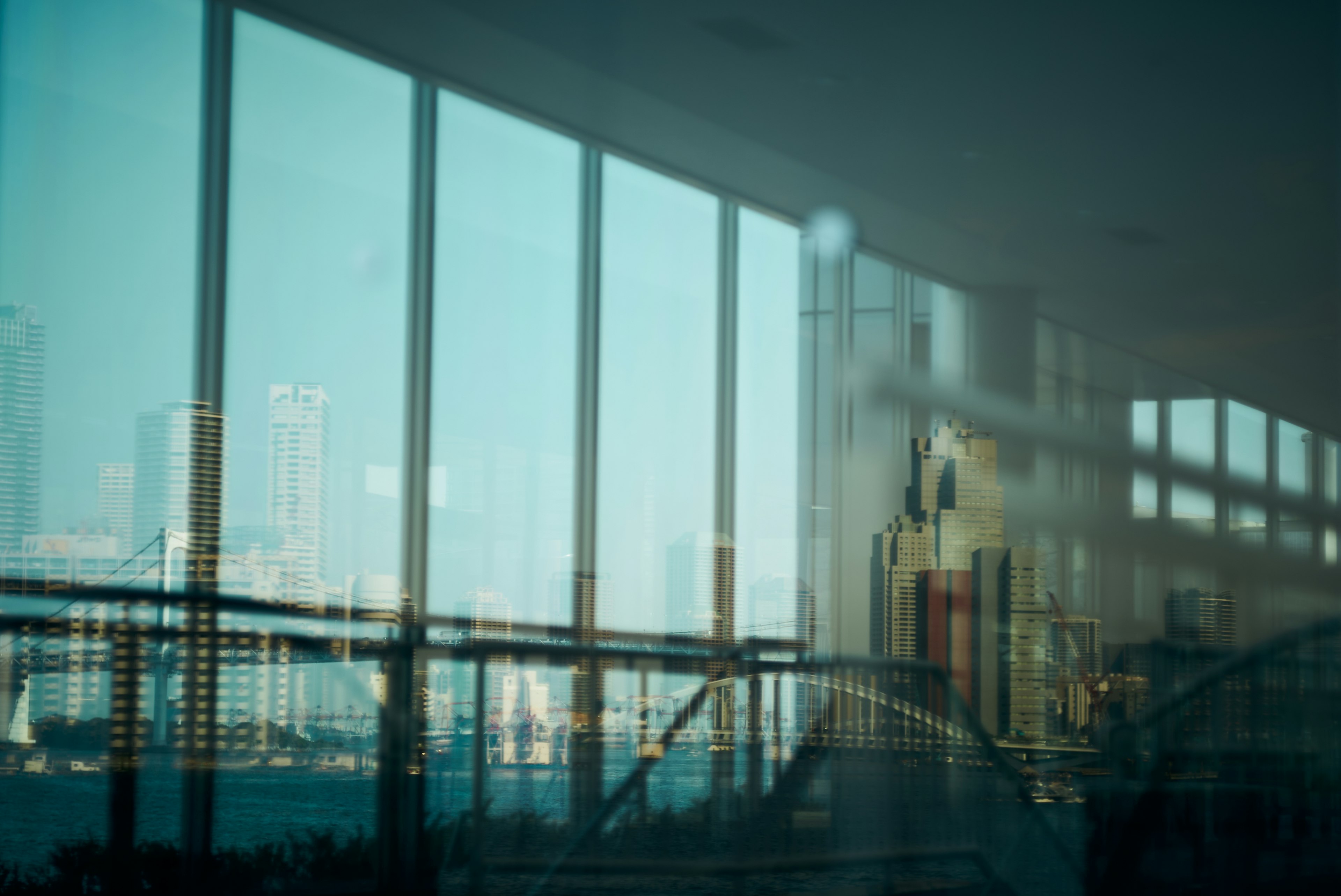 Reflection of city skyline visible through large windows