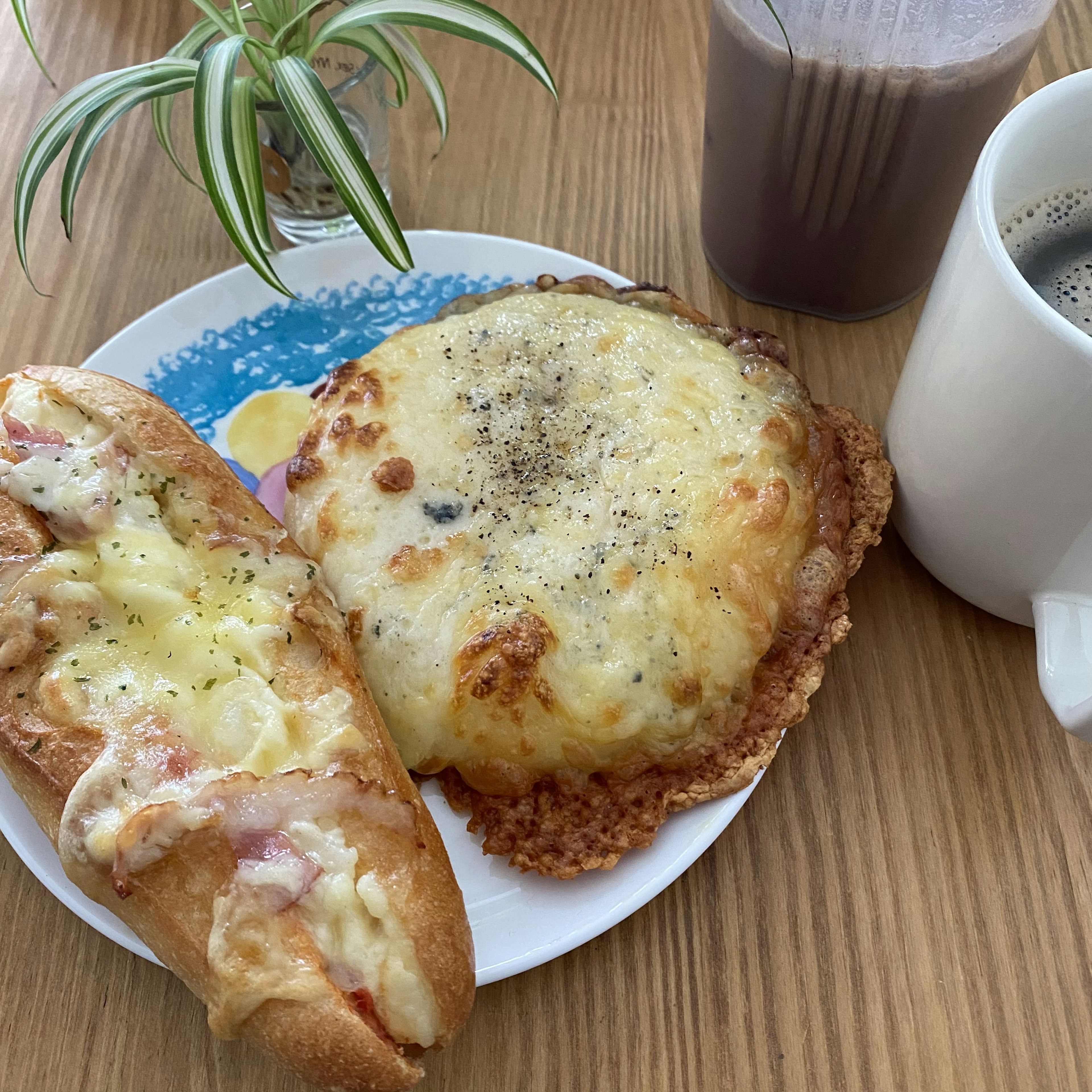 Breakfast plate with baked cheese bread and coffee