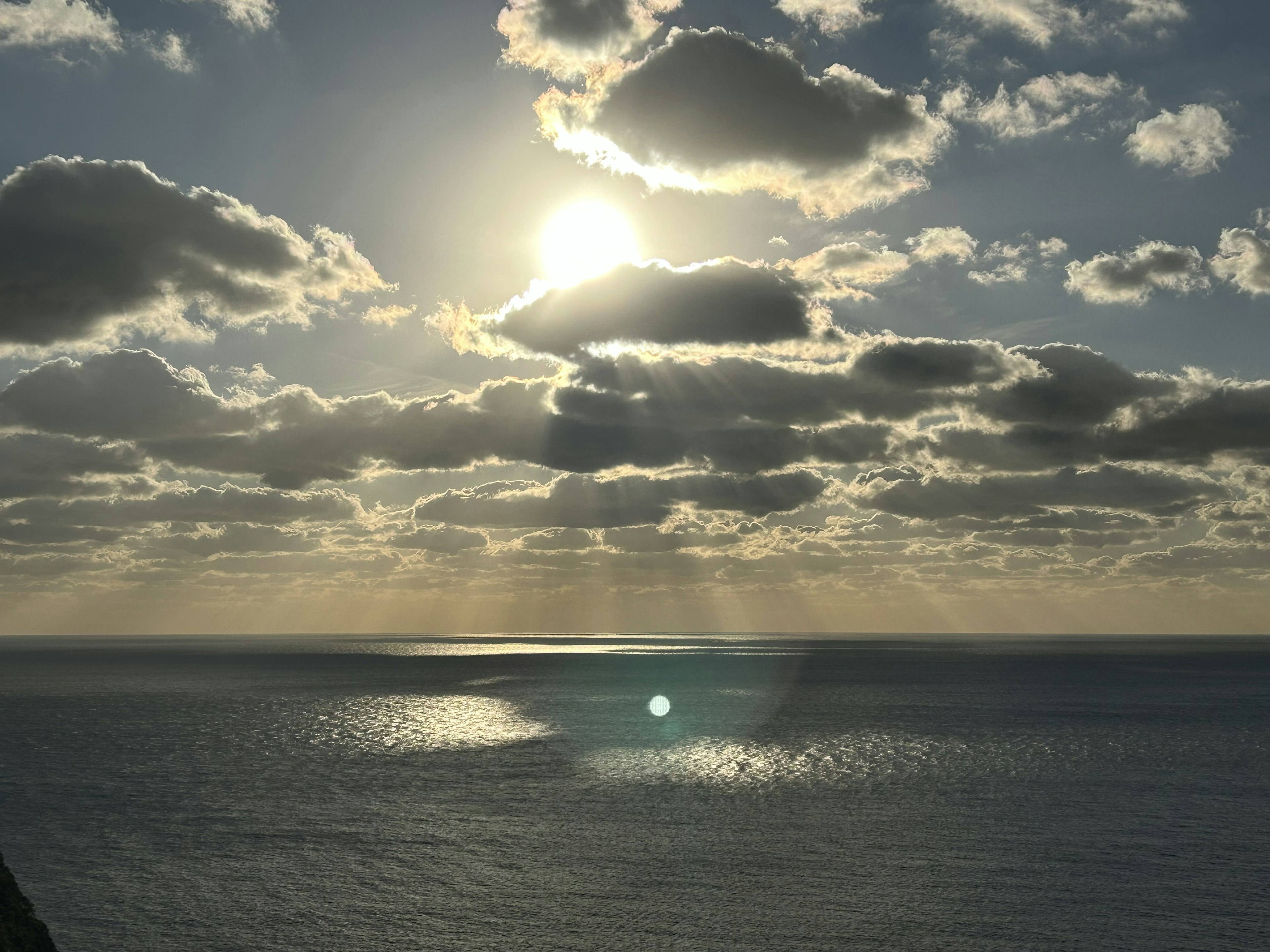 Beautiful seascape with shining sun and clouds