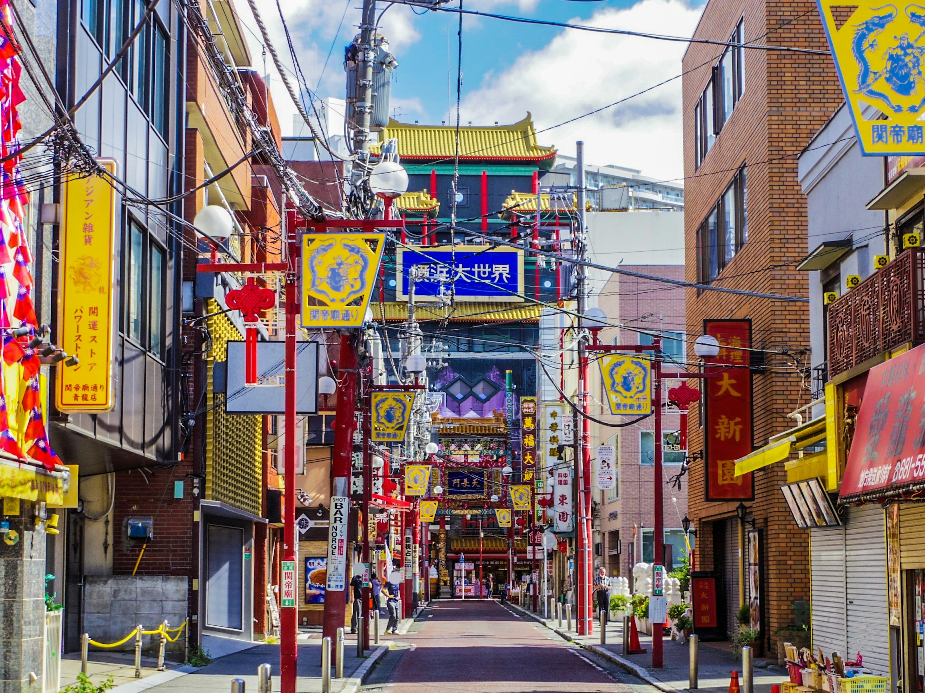 Vibrant street in Chinatown with colorful signs and buildings