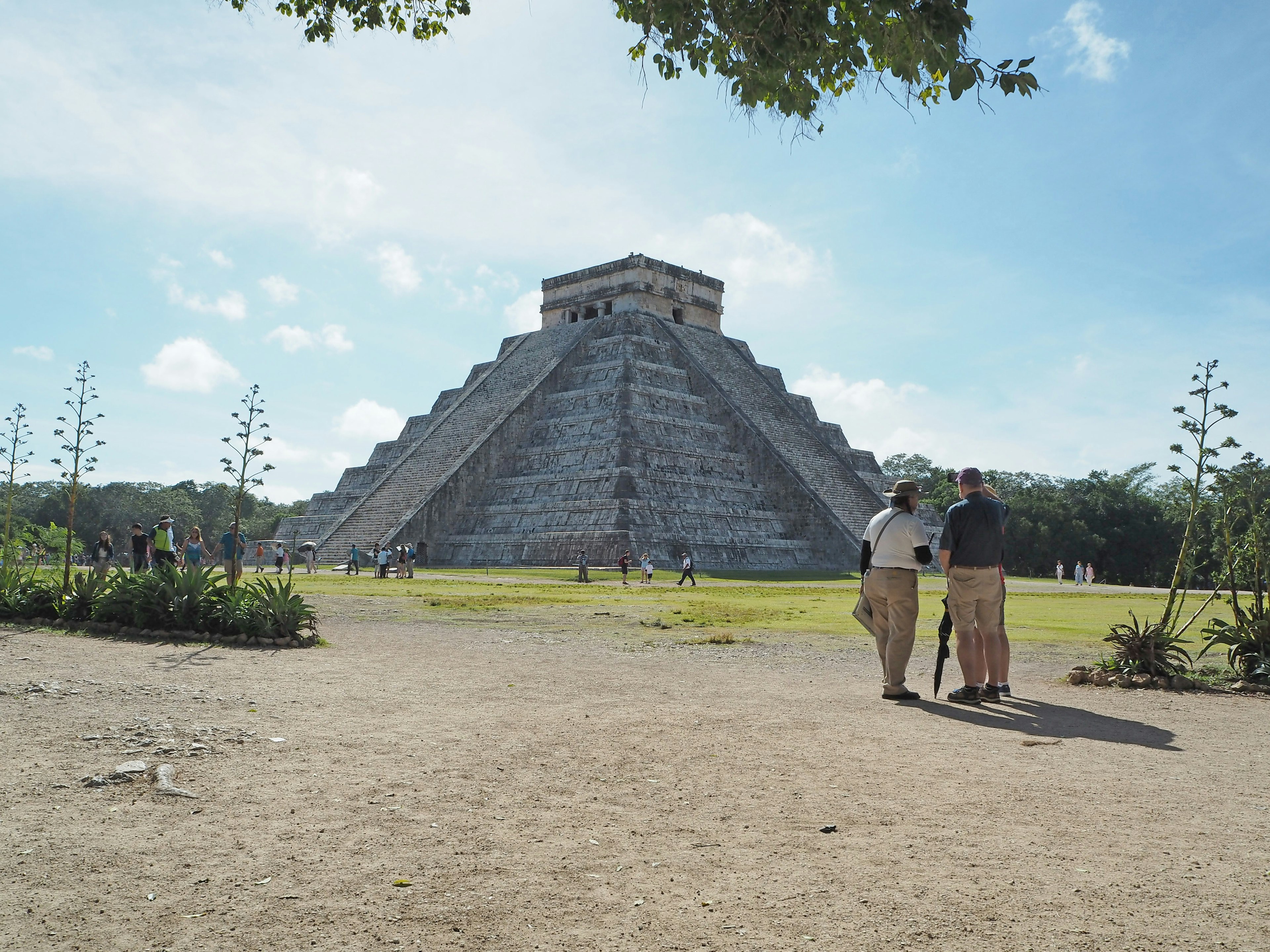 El Castillo pyramid at Chichen Itza with tourists