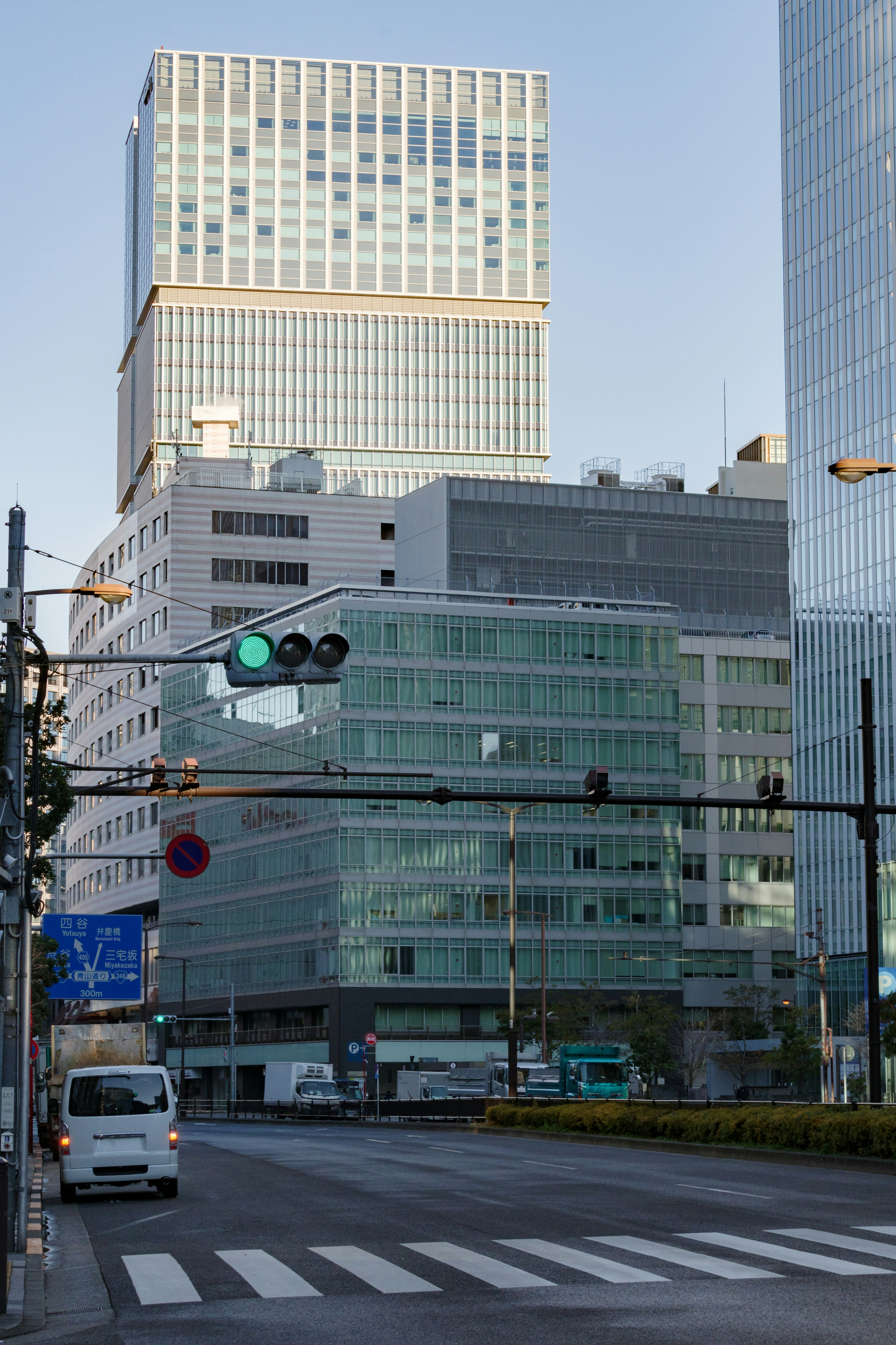 Urban scene featuring tall buildings and traffic lights