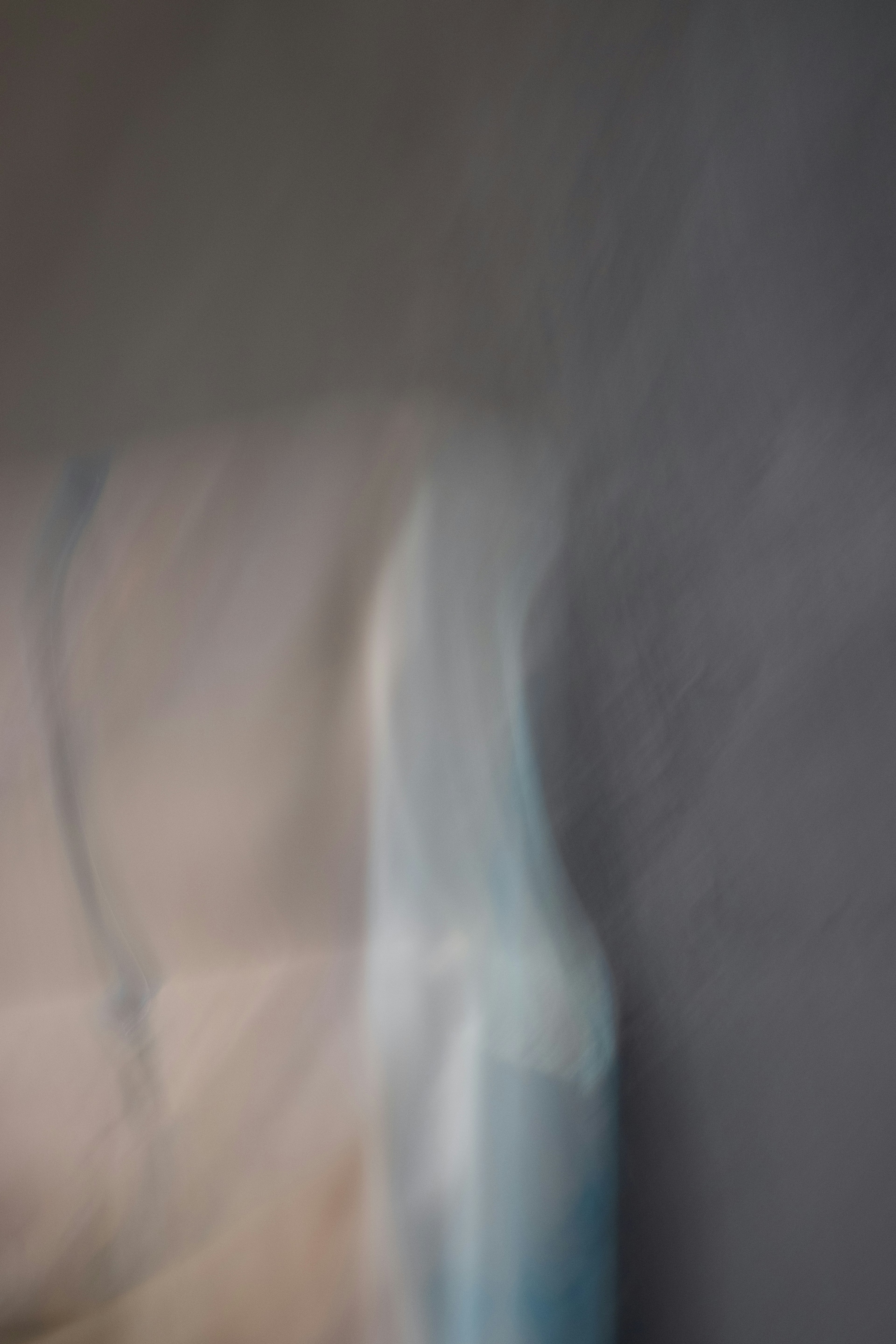 Blurred image of a blue object with a soft background