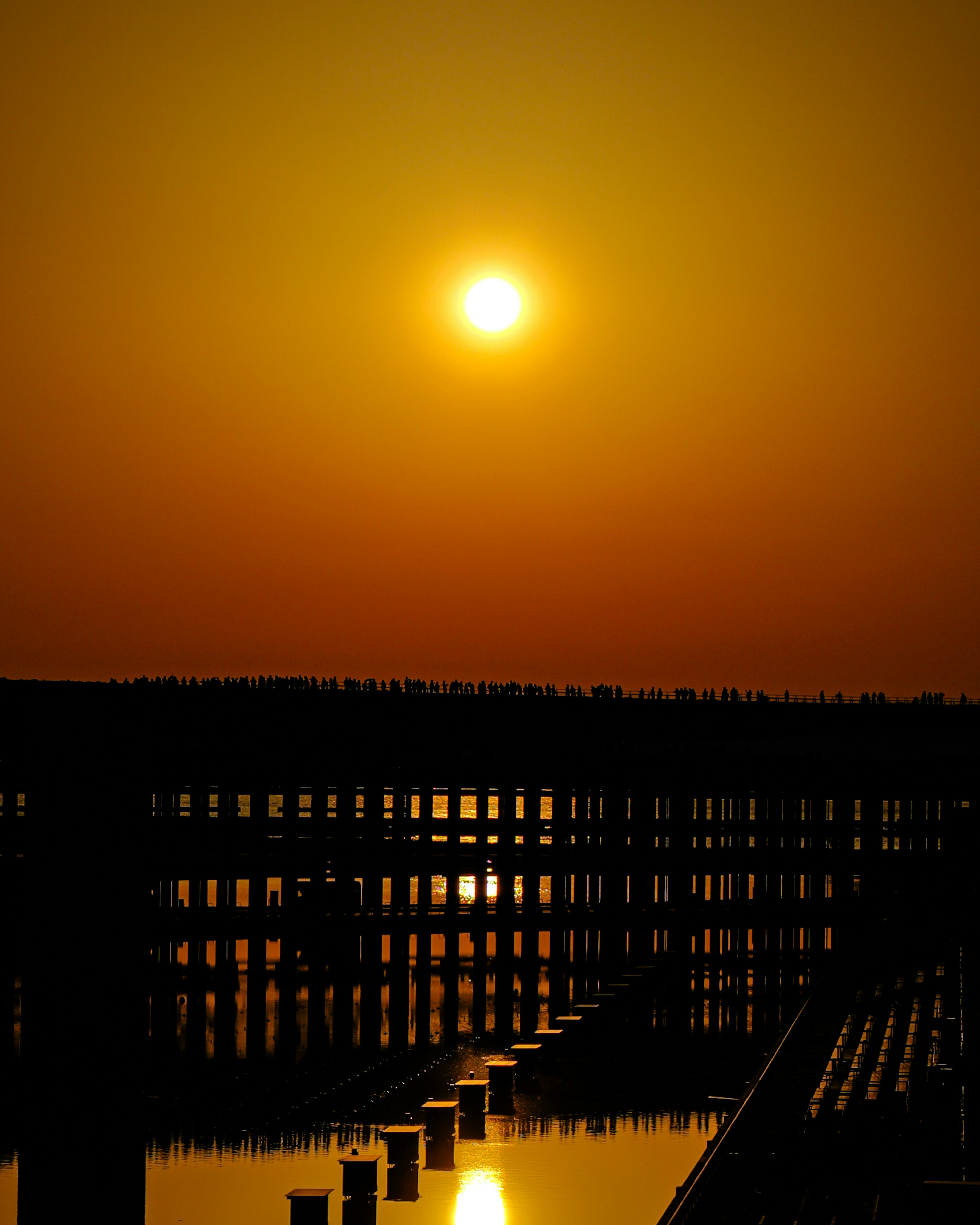 Beautiful landscape with sunset reflecting on the water