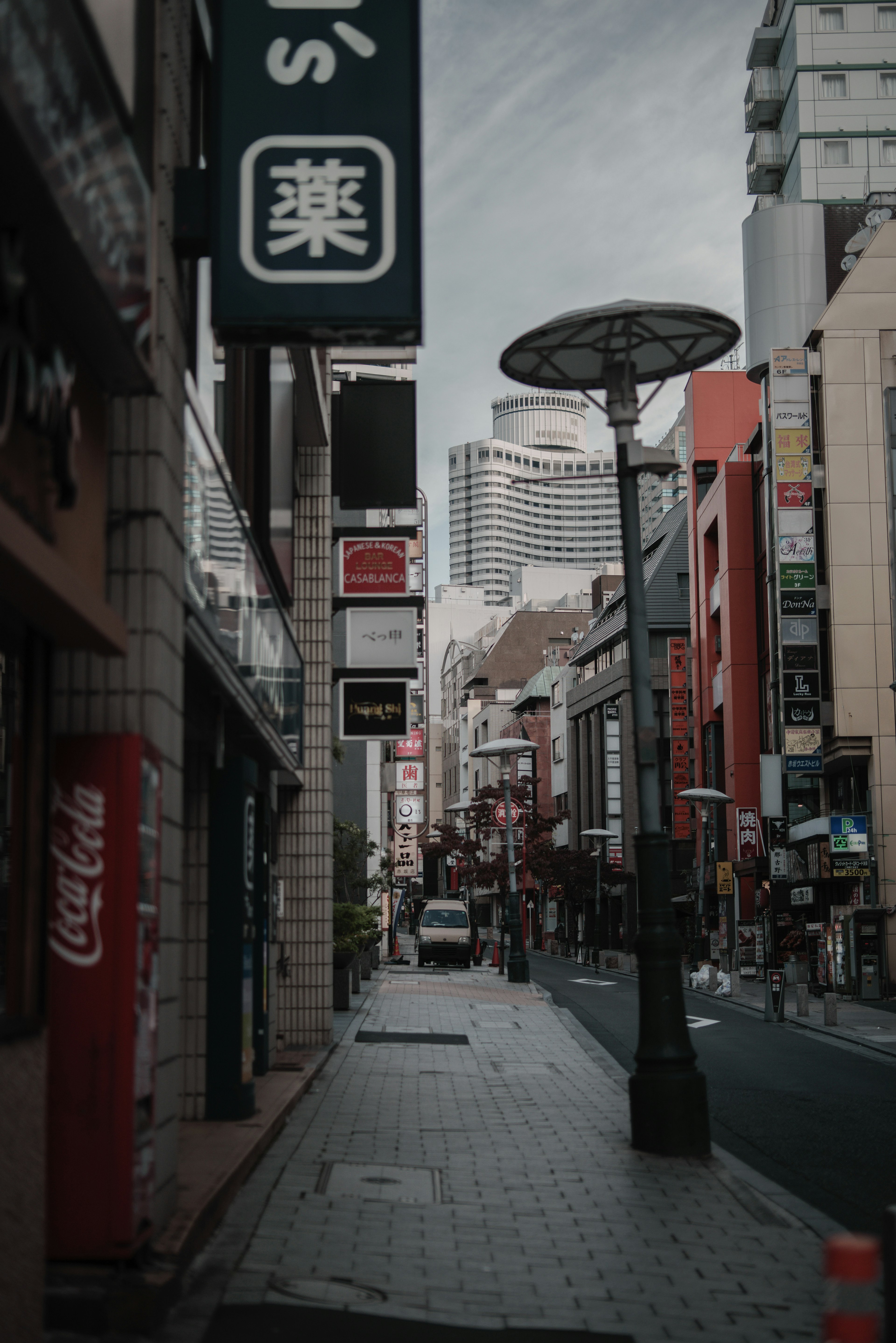 Urban street scene with shops and signage