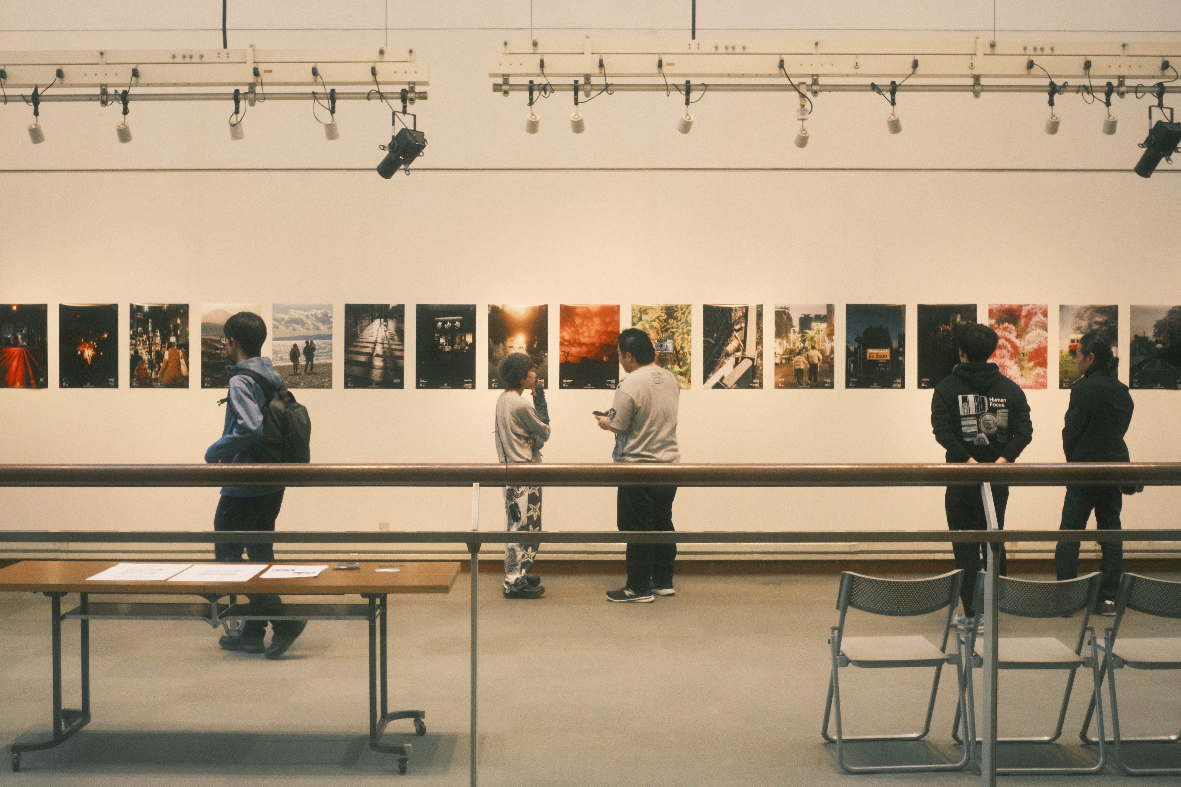 People viewing artwork in an art gallery