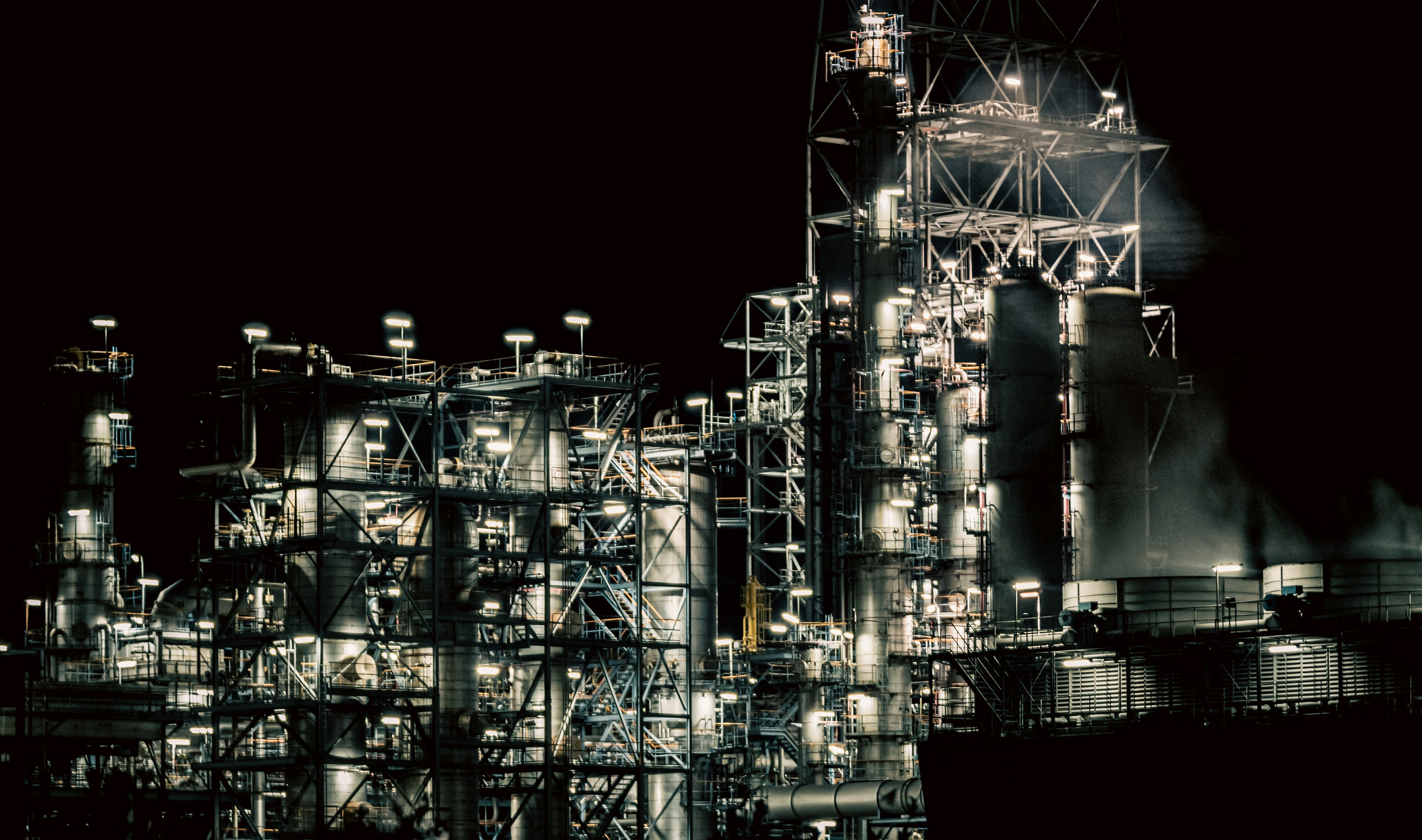 Illuminated industrial facility at night