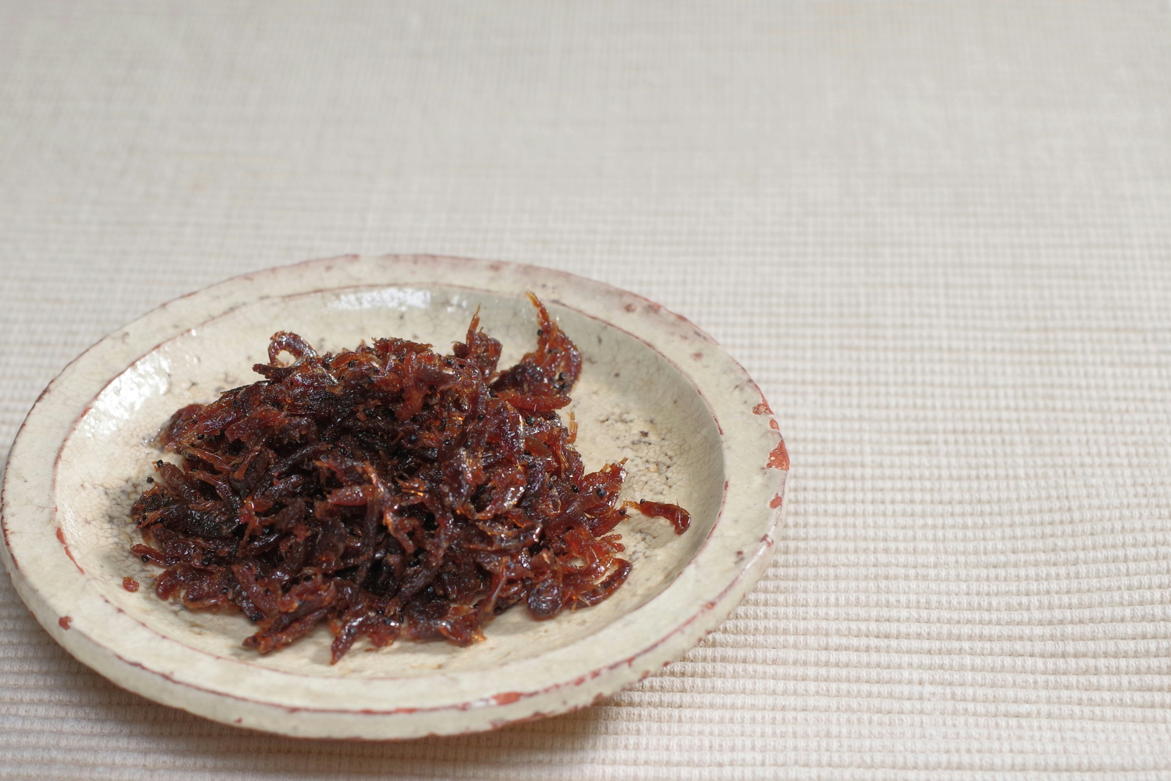 Dried fish flakes on a plate