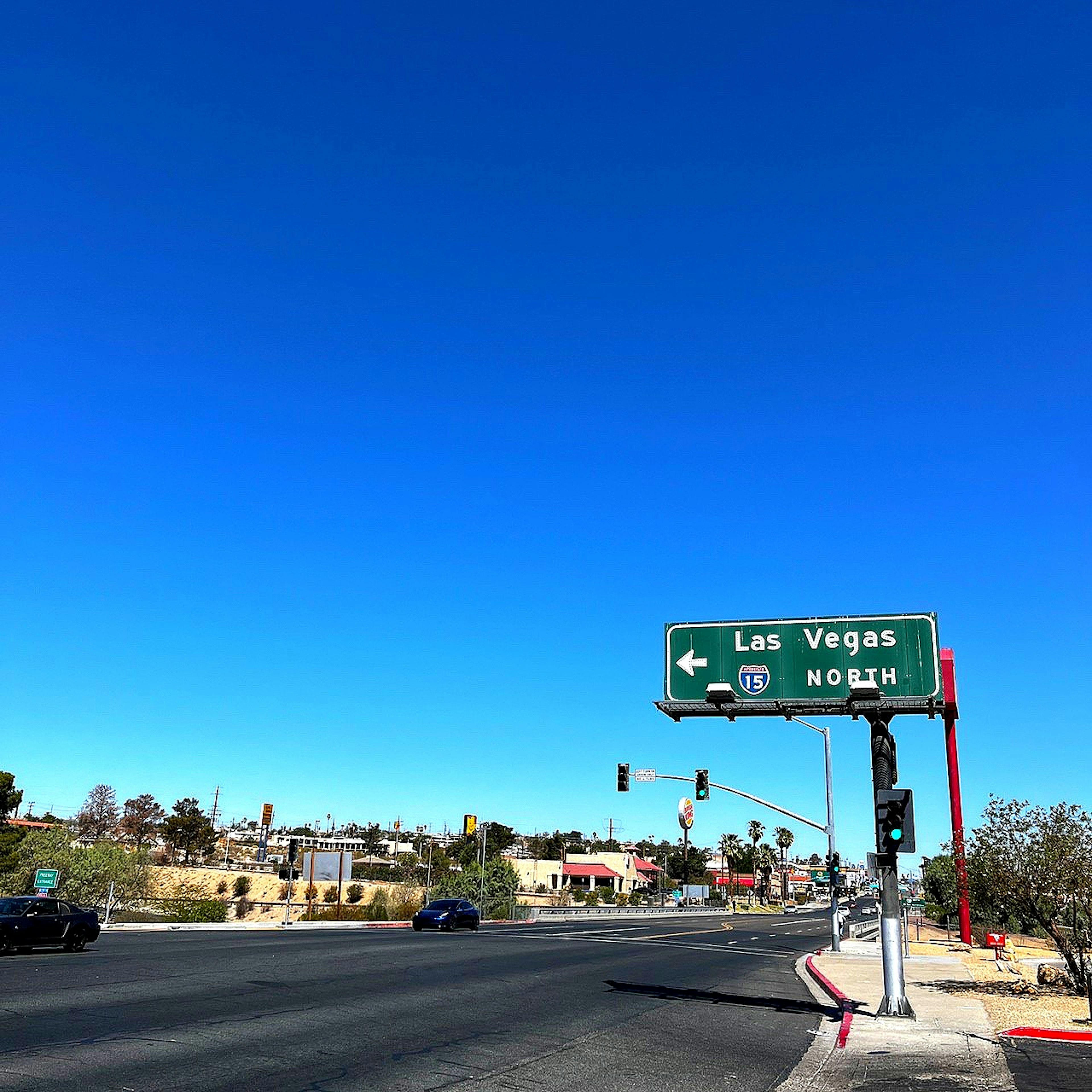 Sign directing to Las Vegas with clear blue sky