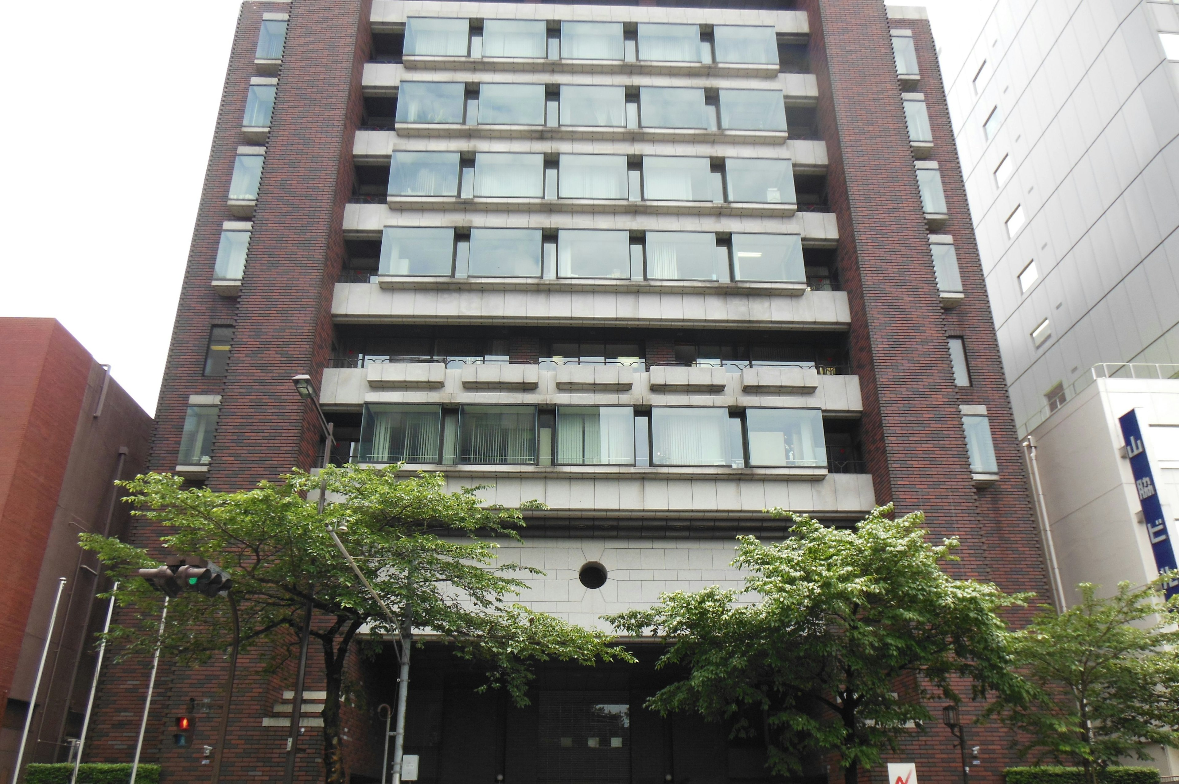 Brick building facade with glass windows