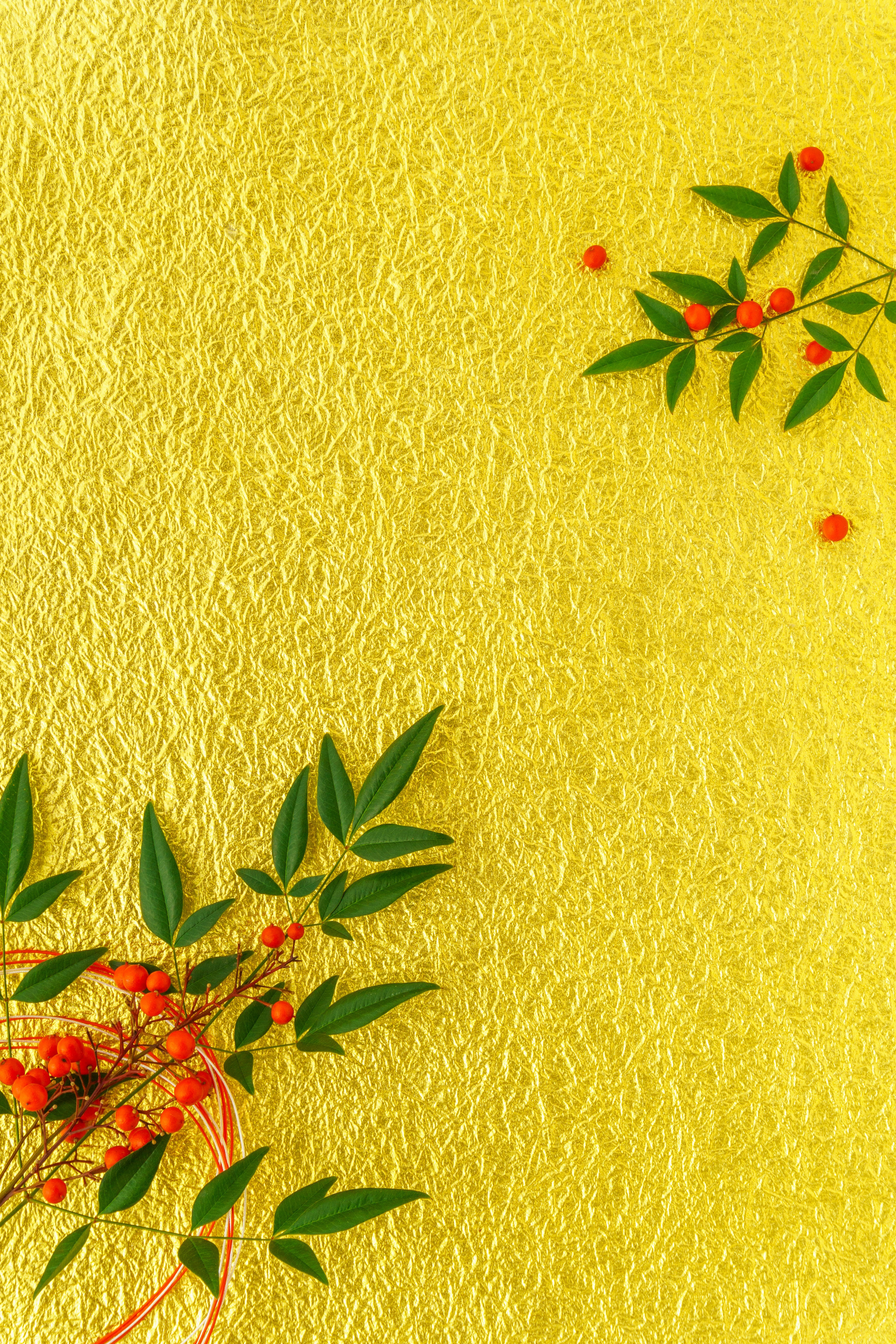 Yellow background with red berries and green leaves decoration