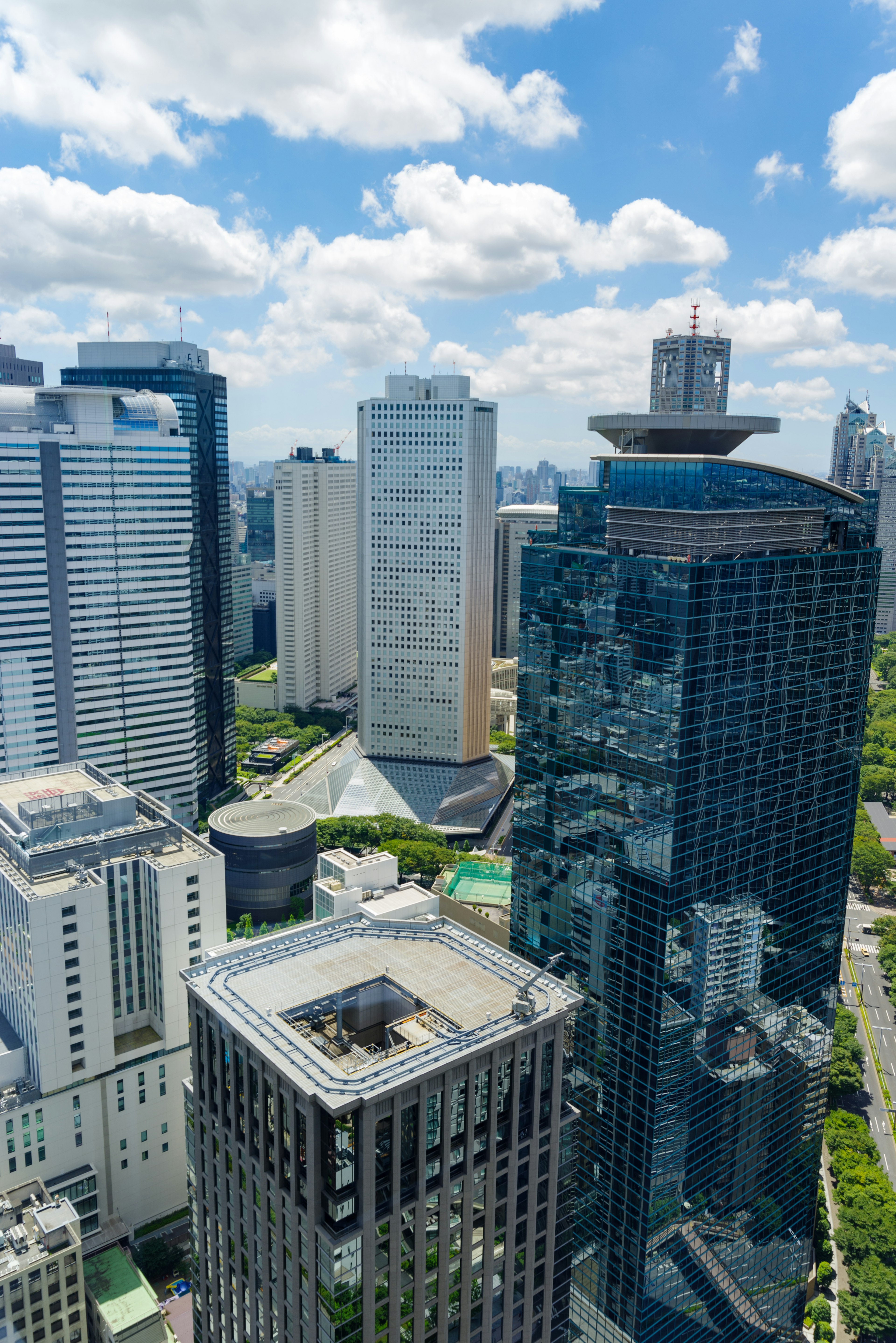 Aerial view of skyscrapers with a bright blue sky