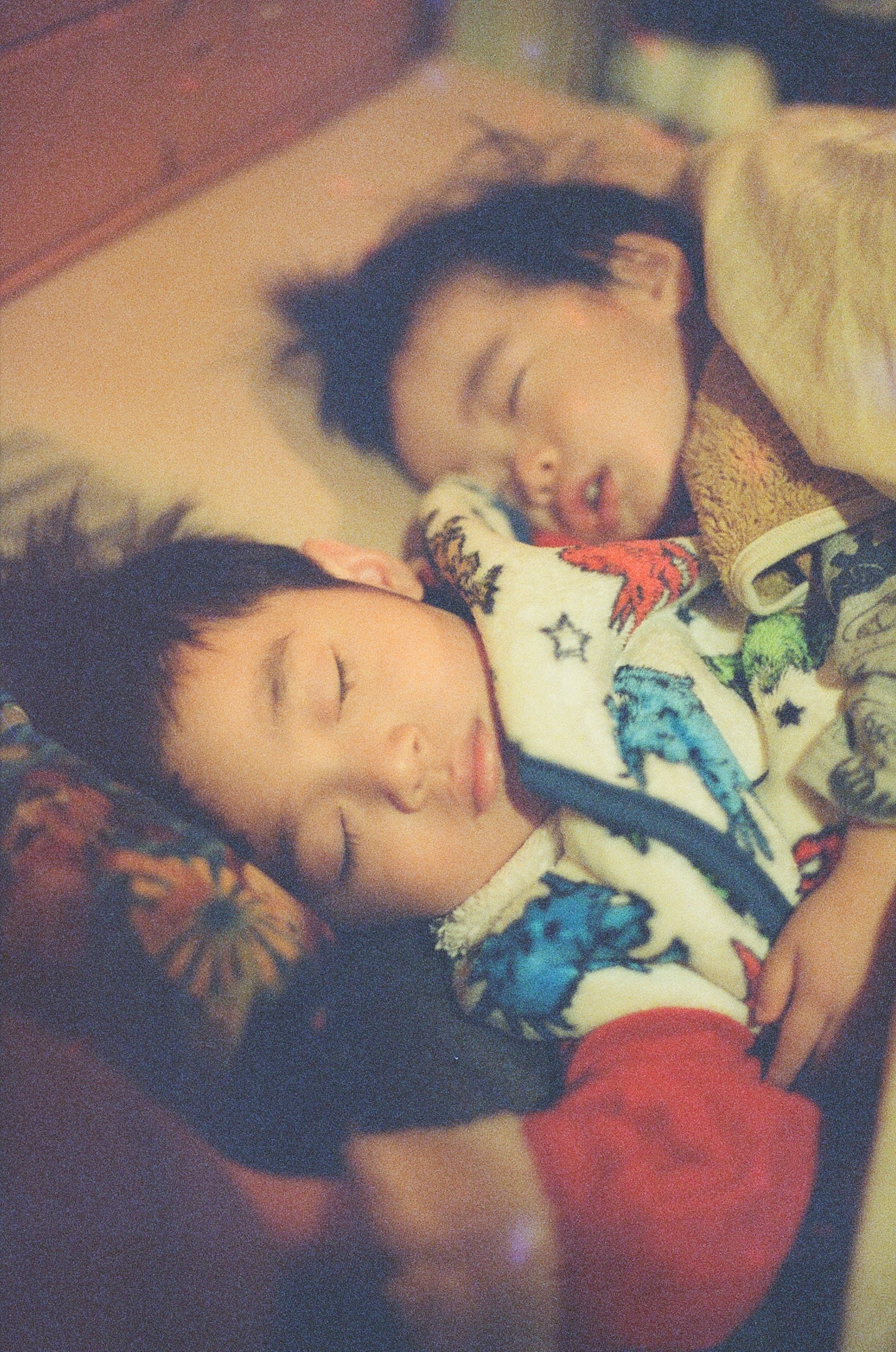 Two children sleeping peacefully together