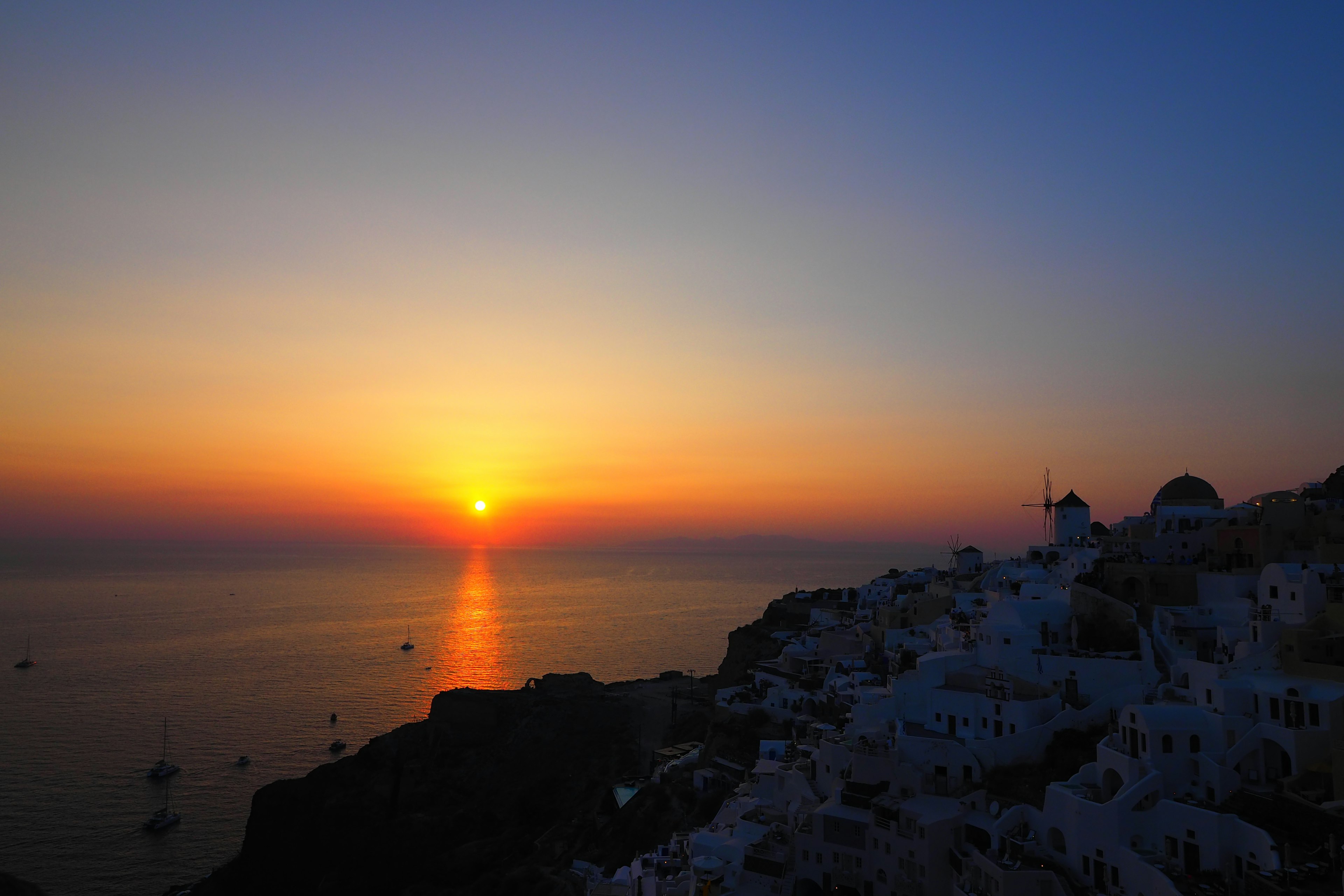 Stunning sunset over the sea in Santorini