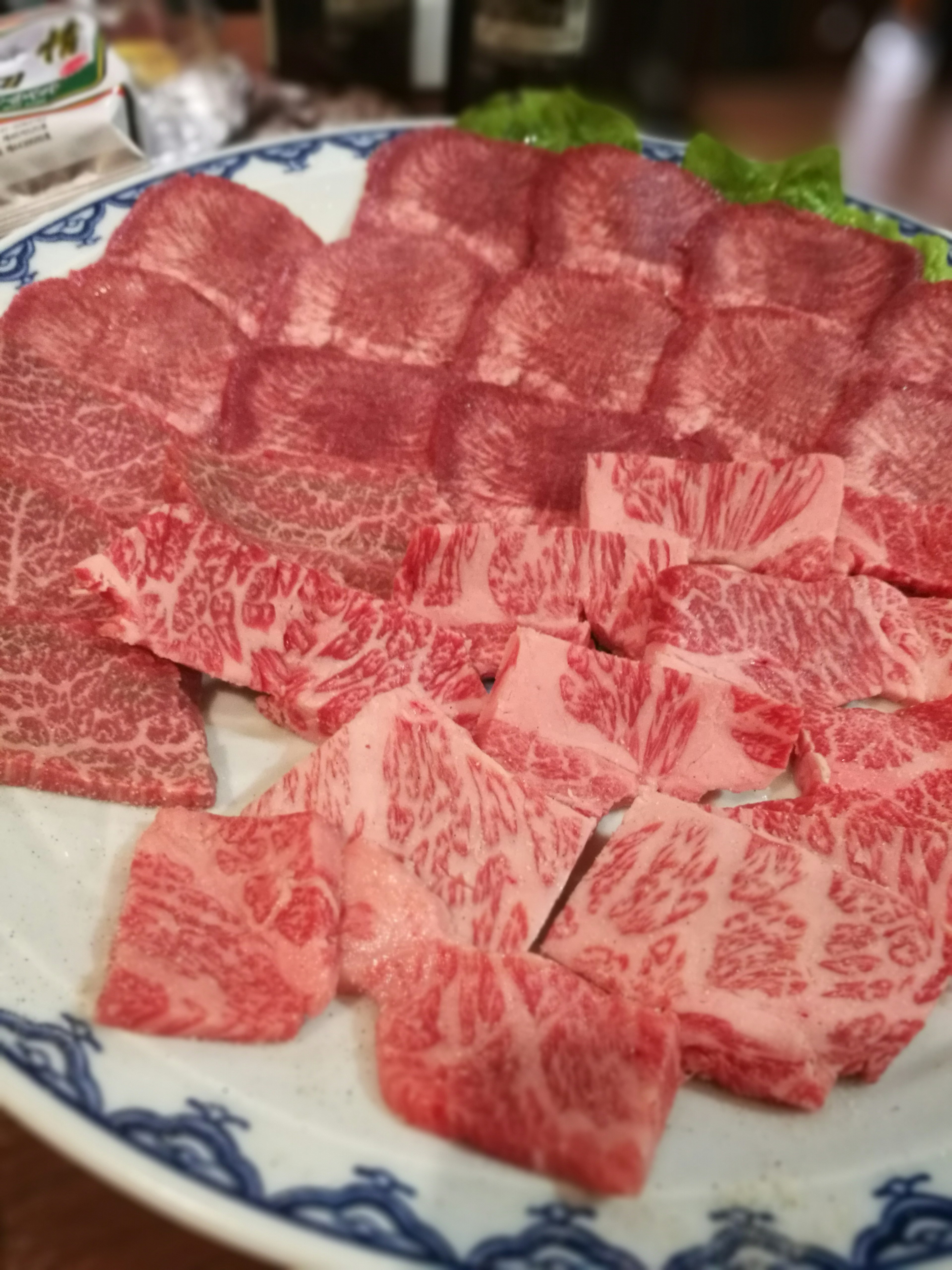 A beautifully arranged platter of Wagyu beef slices