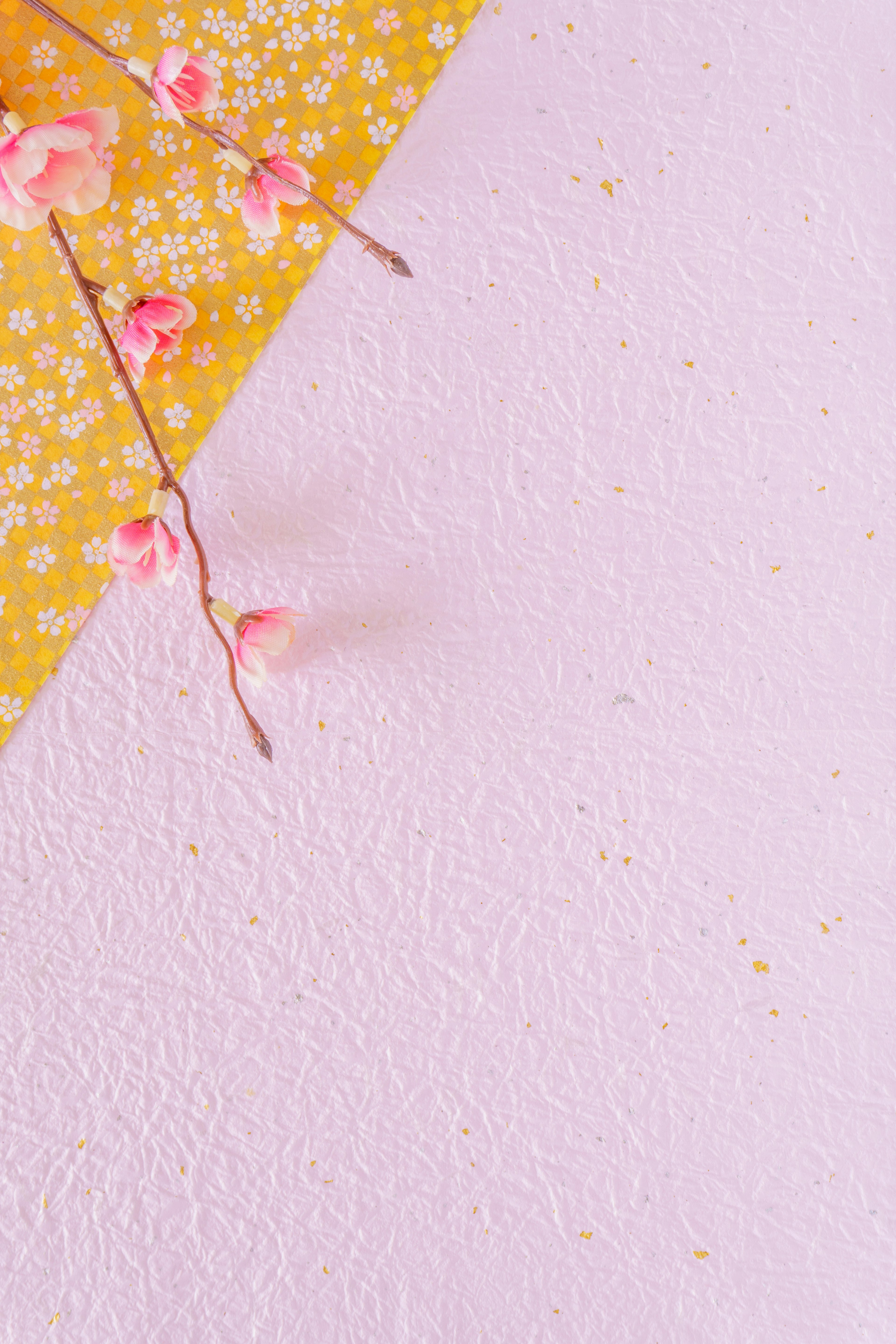 Yellow floral pattern with soft purple background and small cherry blossom branch