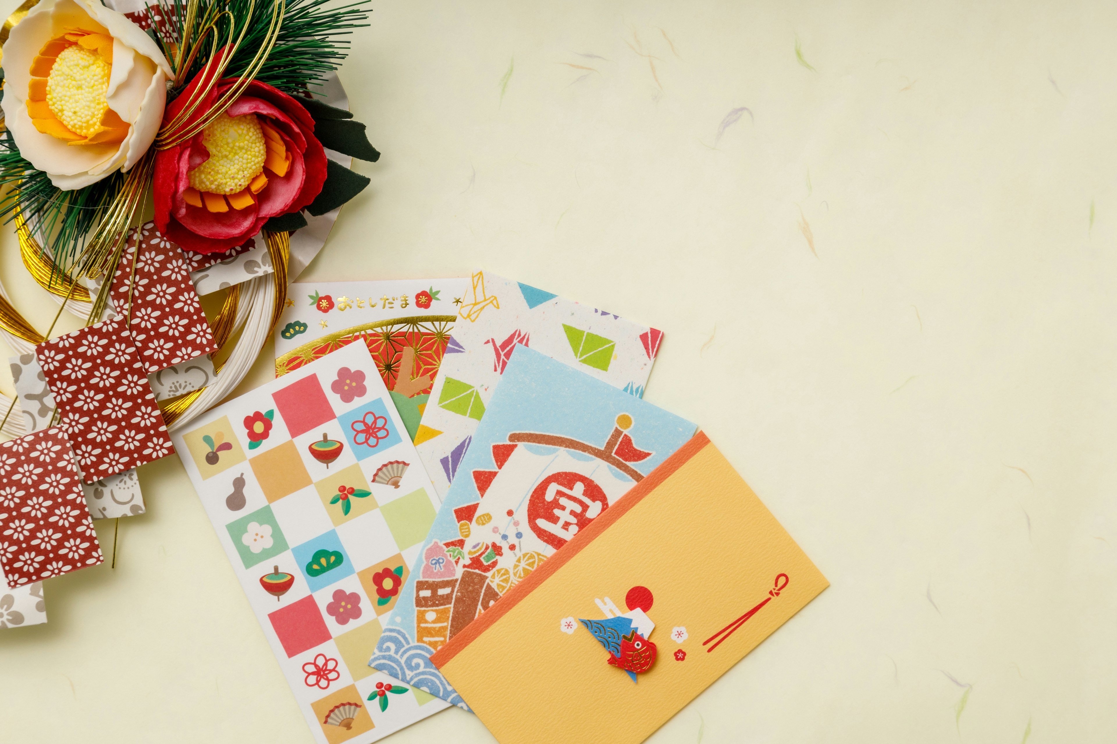 Colorful stickers and cards arranged with decorative flowers