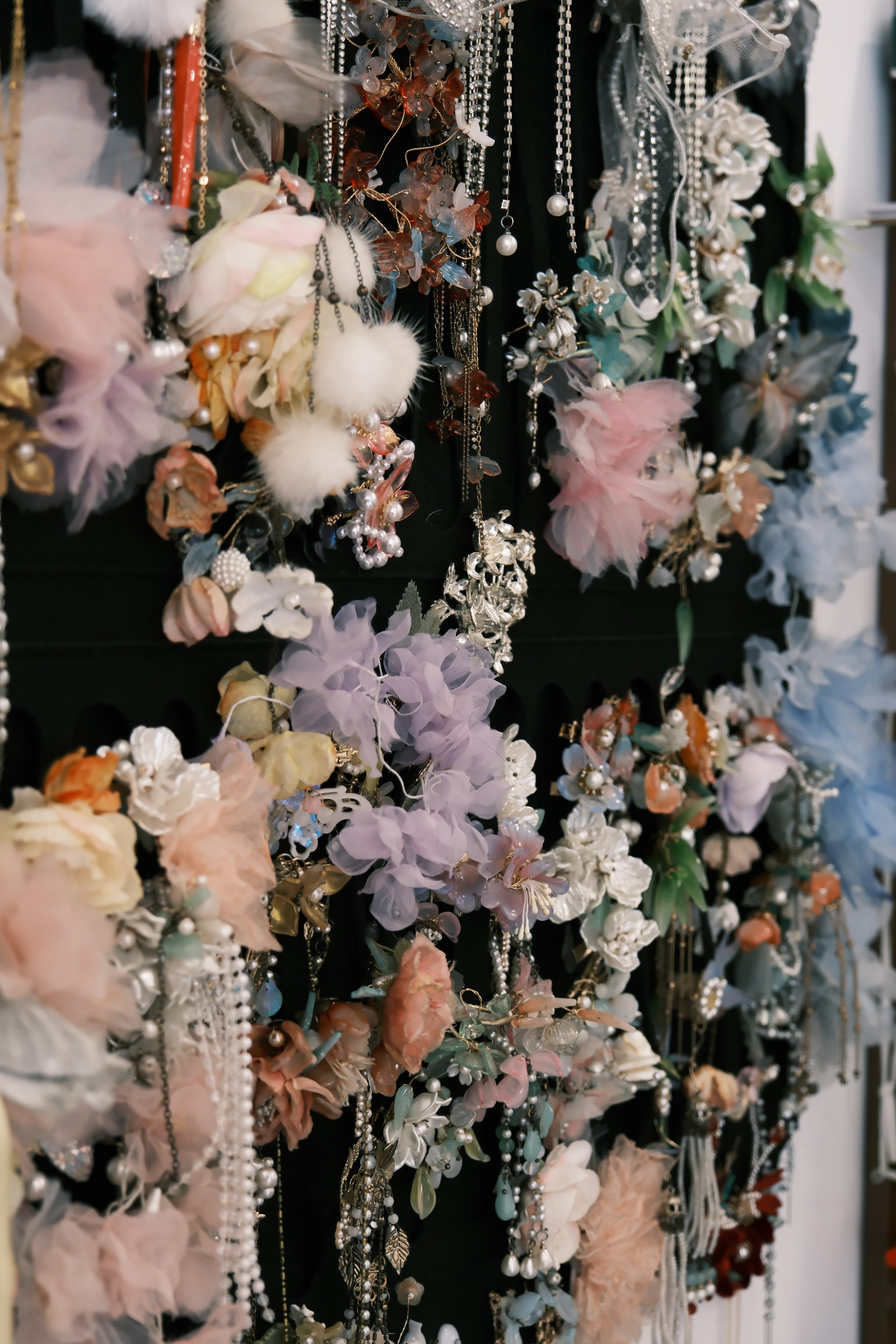 Colorful hair accessories displayed on a wall