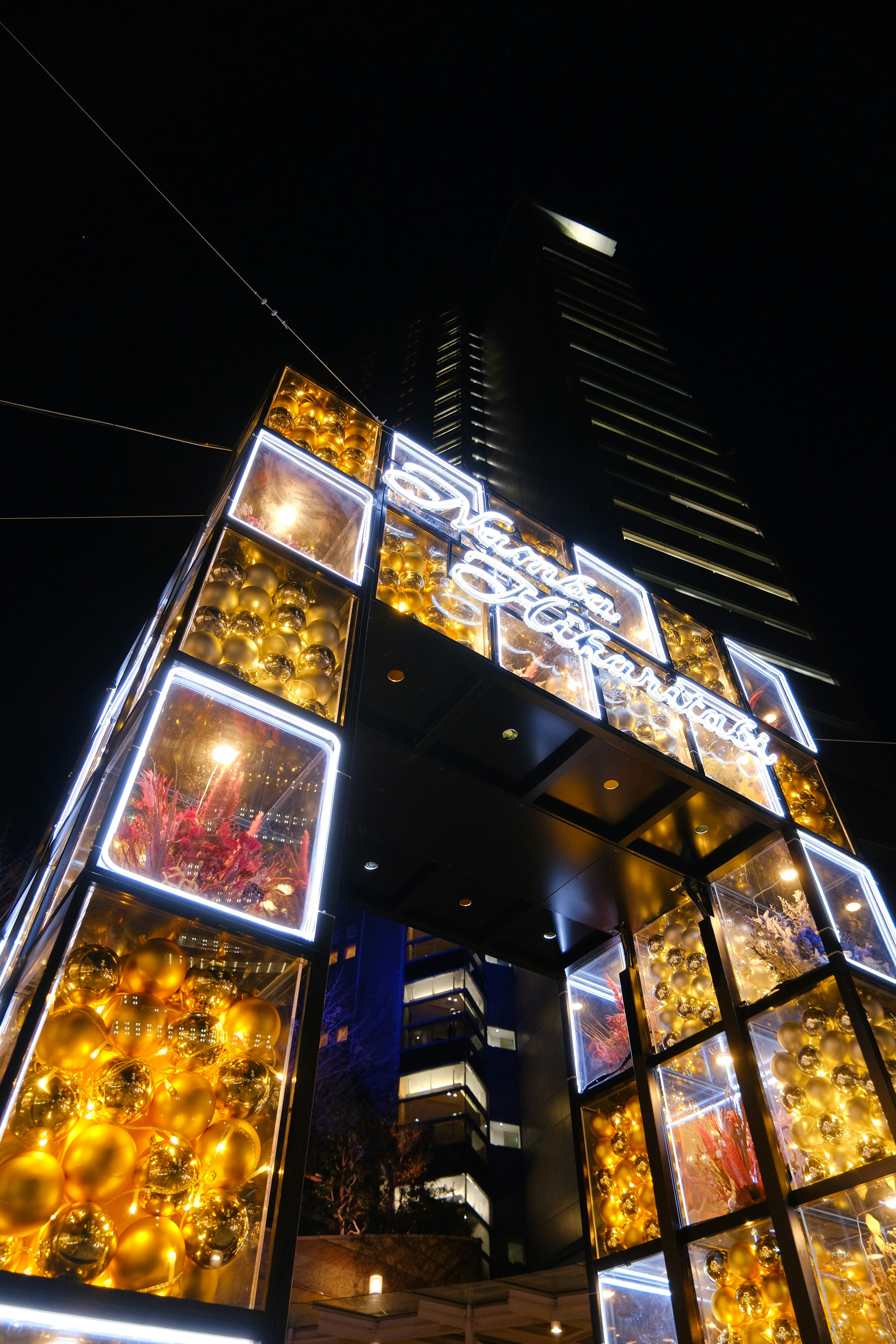 Modern building entrance illuminated at night