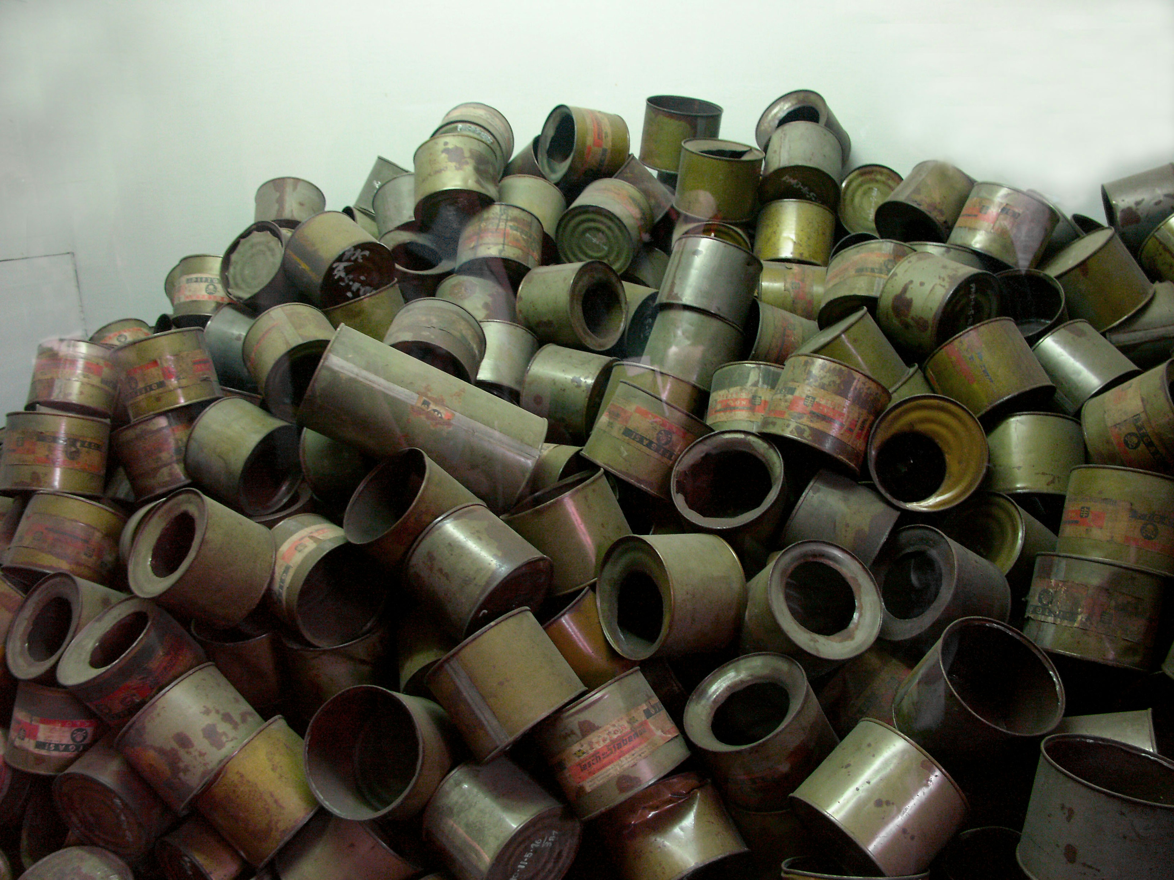 A pile of metal pipes stacked together