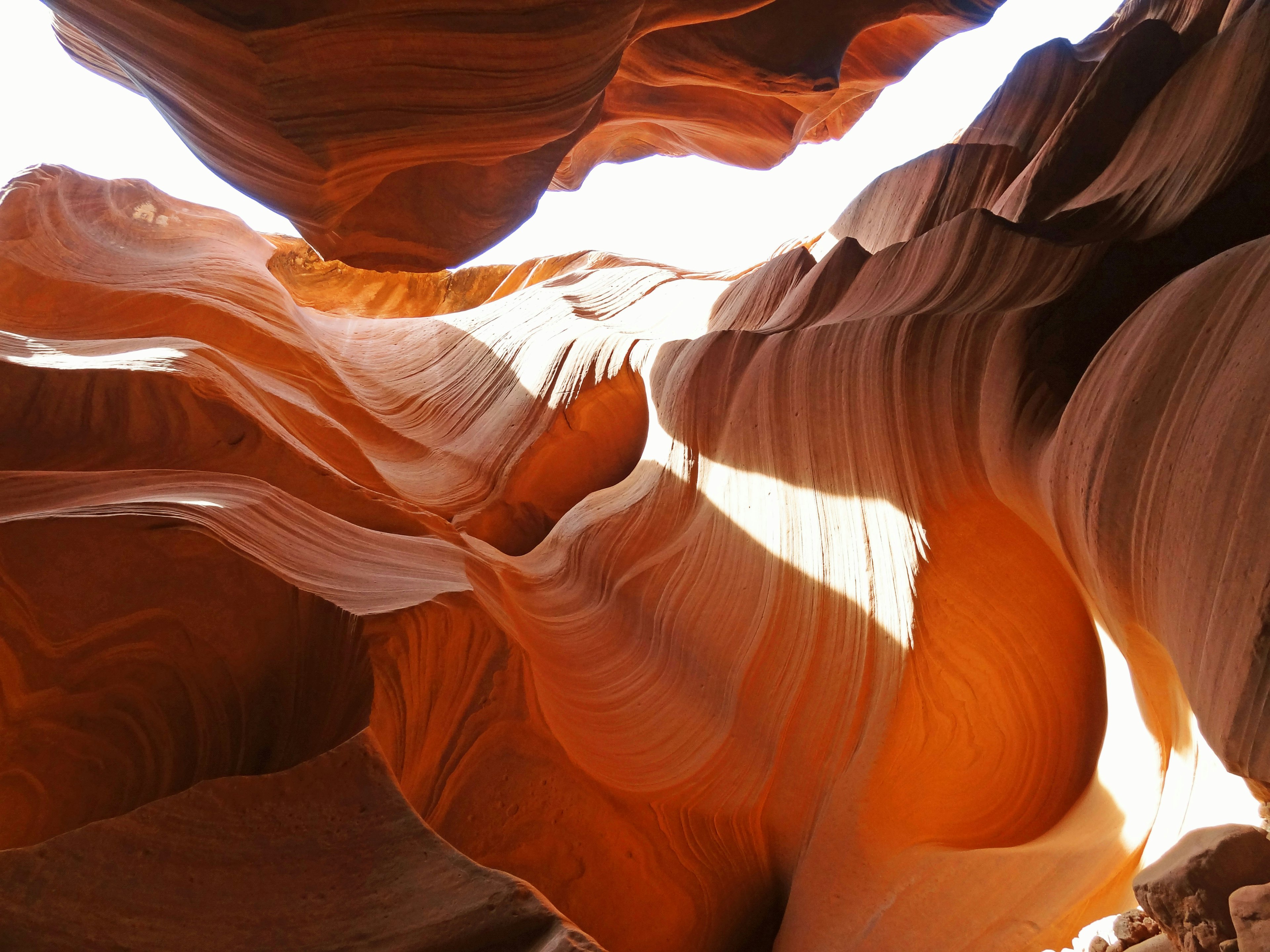 Stunning sandstone layers of Antelope Canyon with light reflections