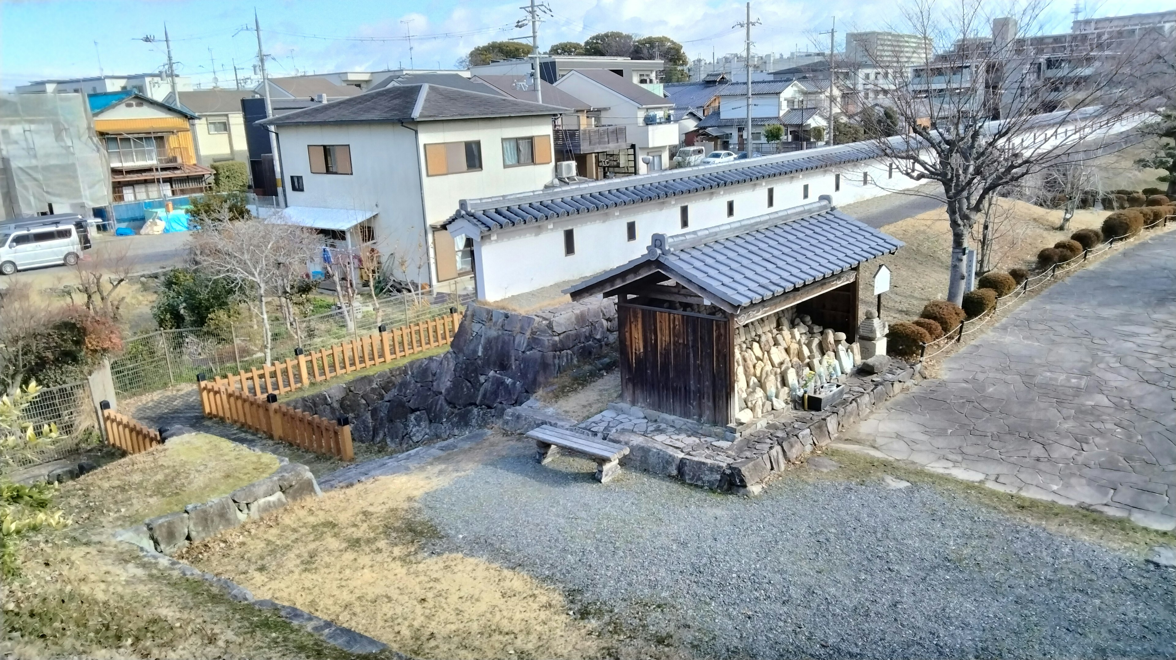 A landscape photo showing houses and a garden