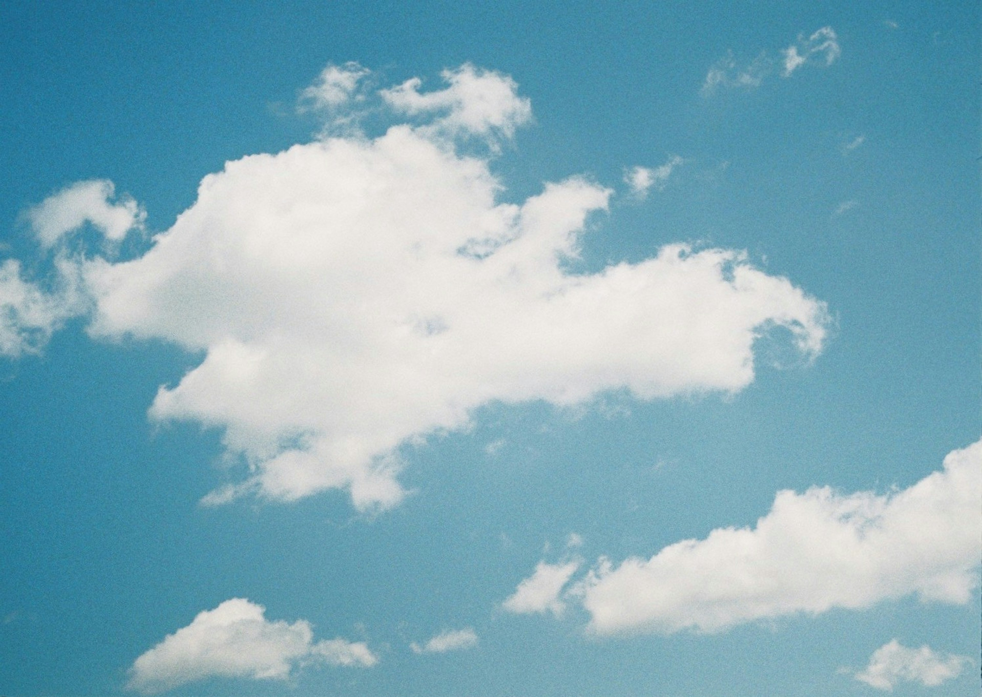 White clouds floating in a blue sky