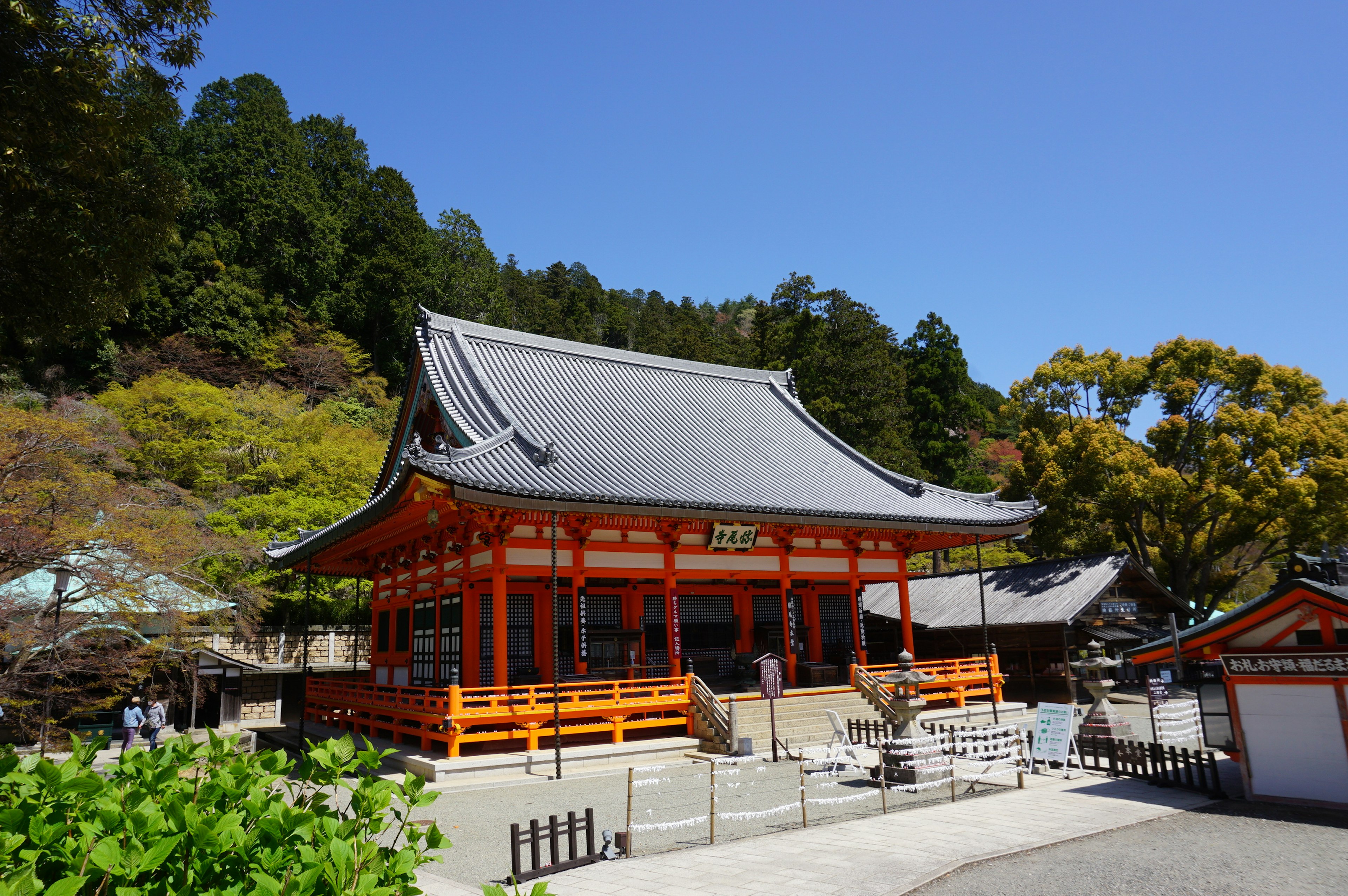 Beautiful orange temple building under a clear blue sky