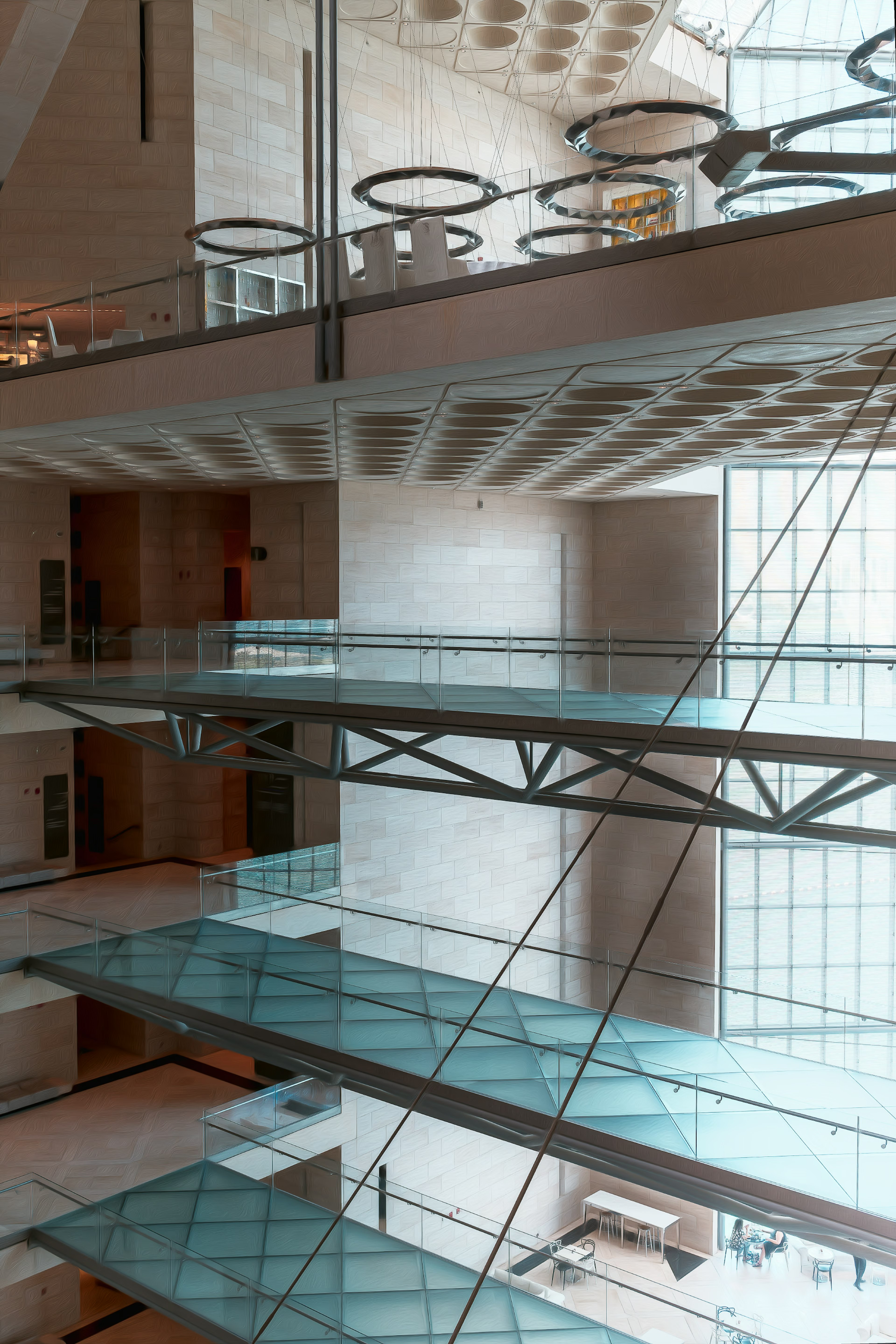 Modern interior of a building featuring glass floors and metal structure