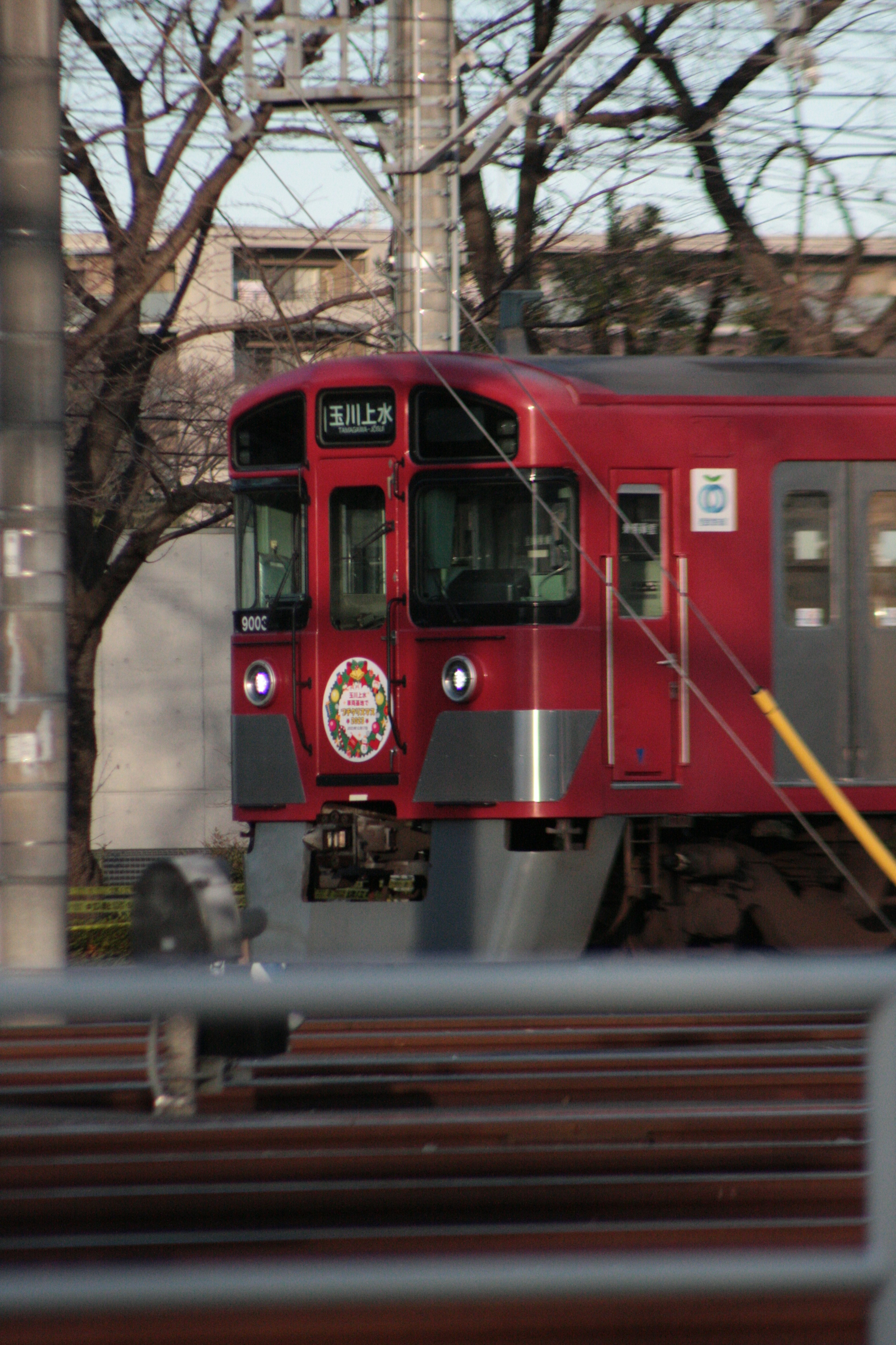 Front view of a distinctive red train